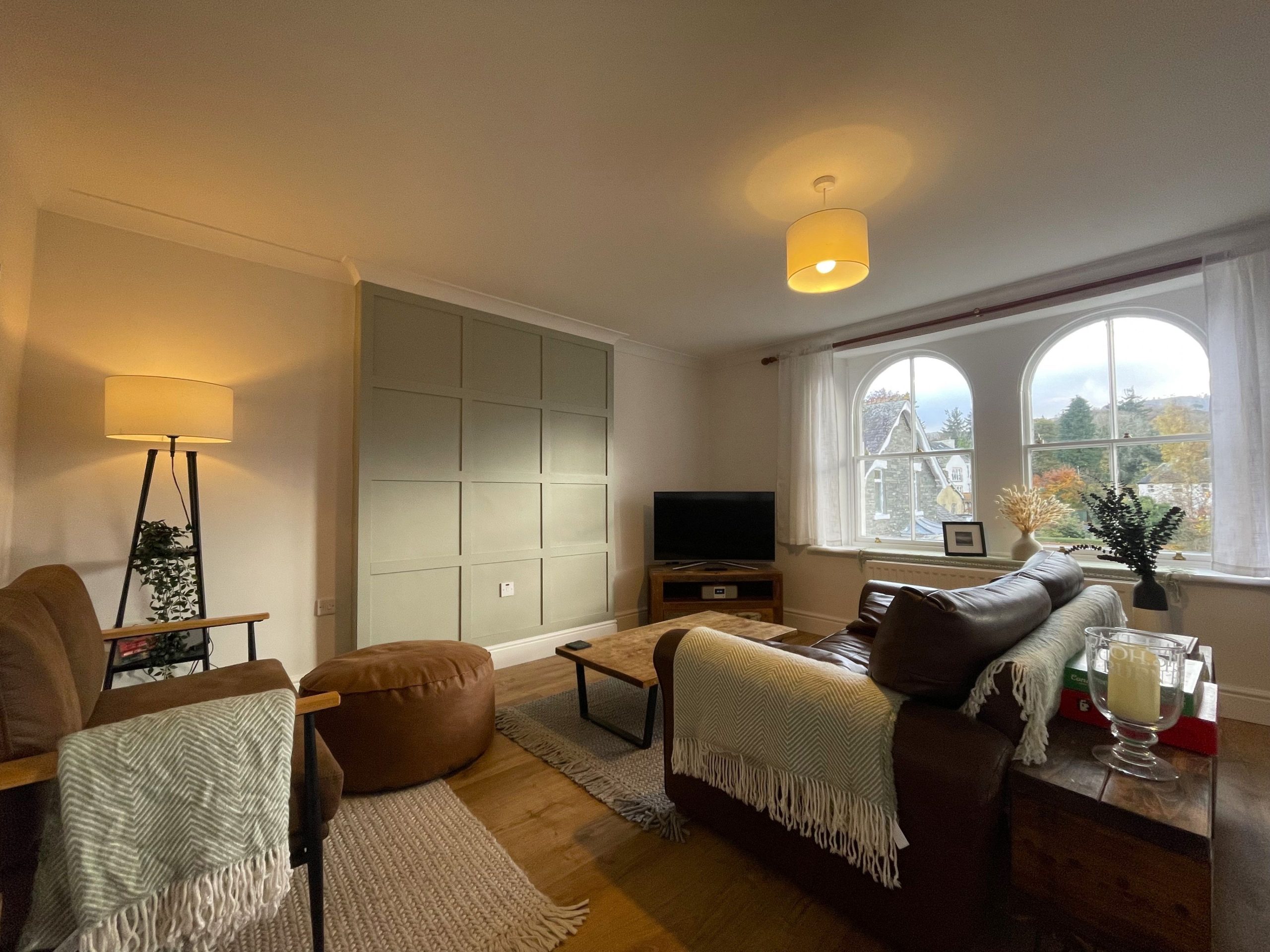 The living area is spacious and filled with light 