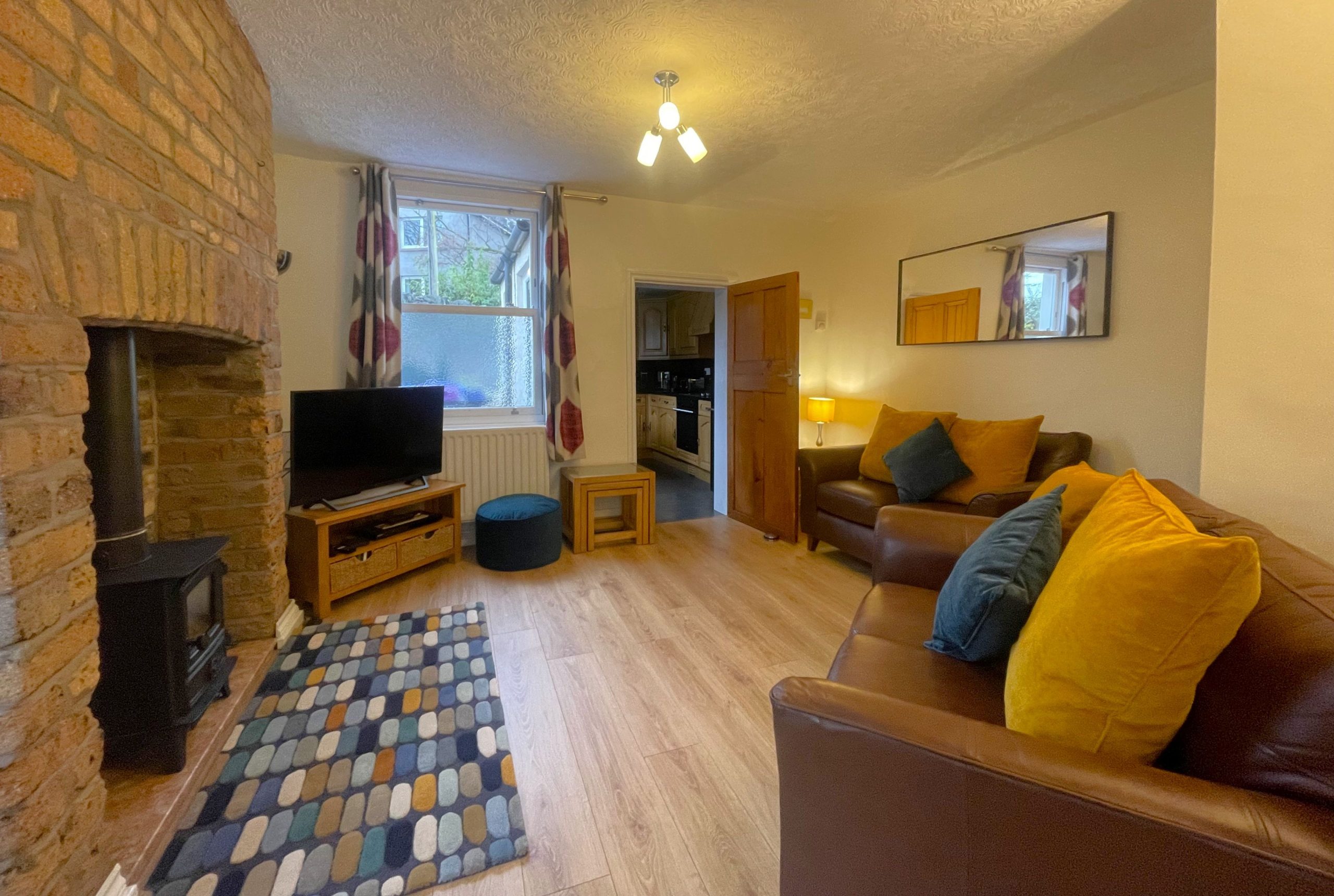 The front room is a warm and inviting space at the rear of the property