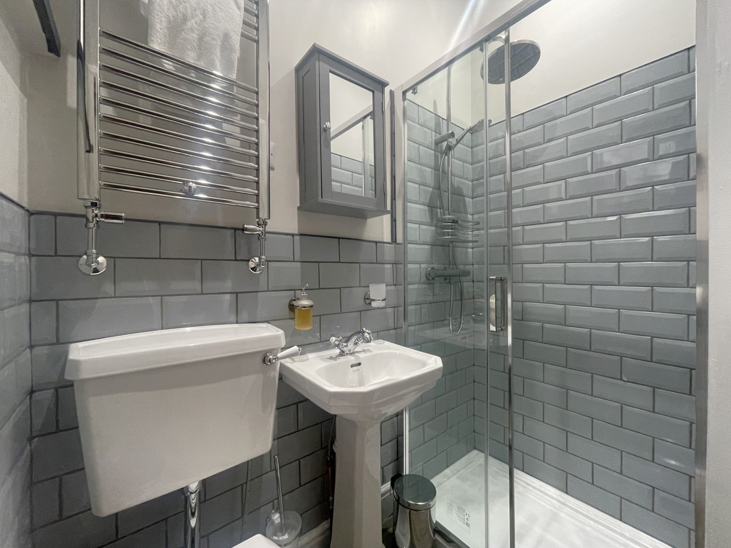 The ensuite comprises walk in shower, WC, heated towel rail and sink.