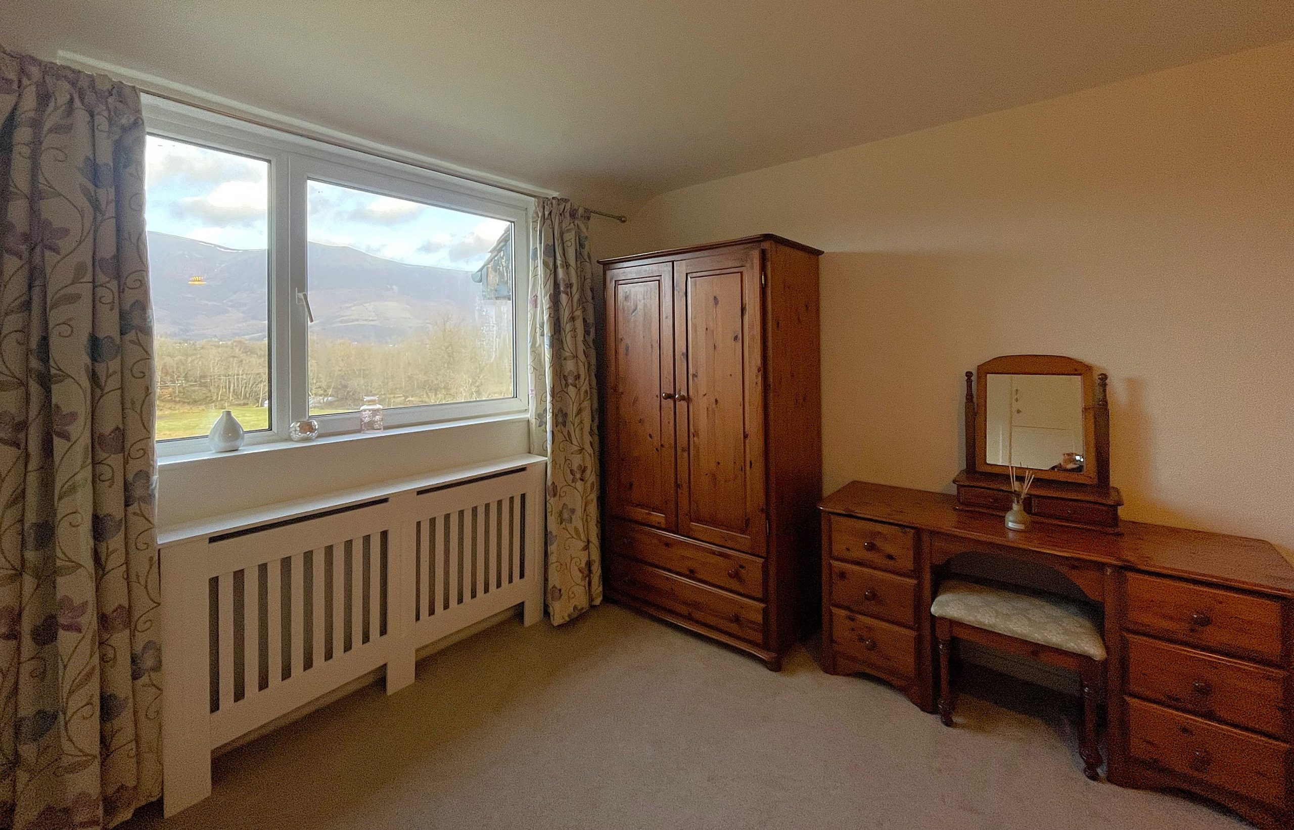 Wake up to a beautiful view of the fells from the comfort of your bed