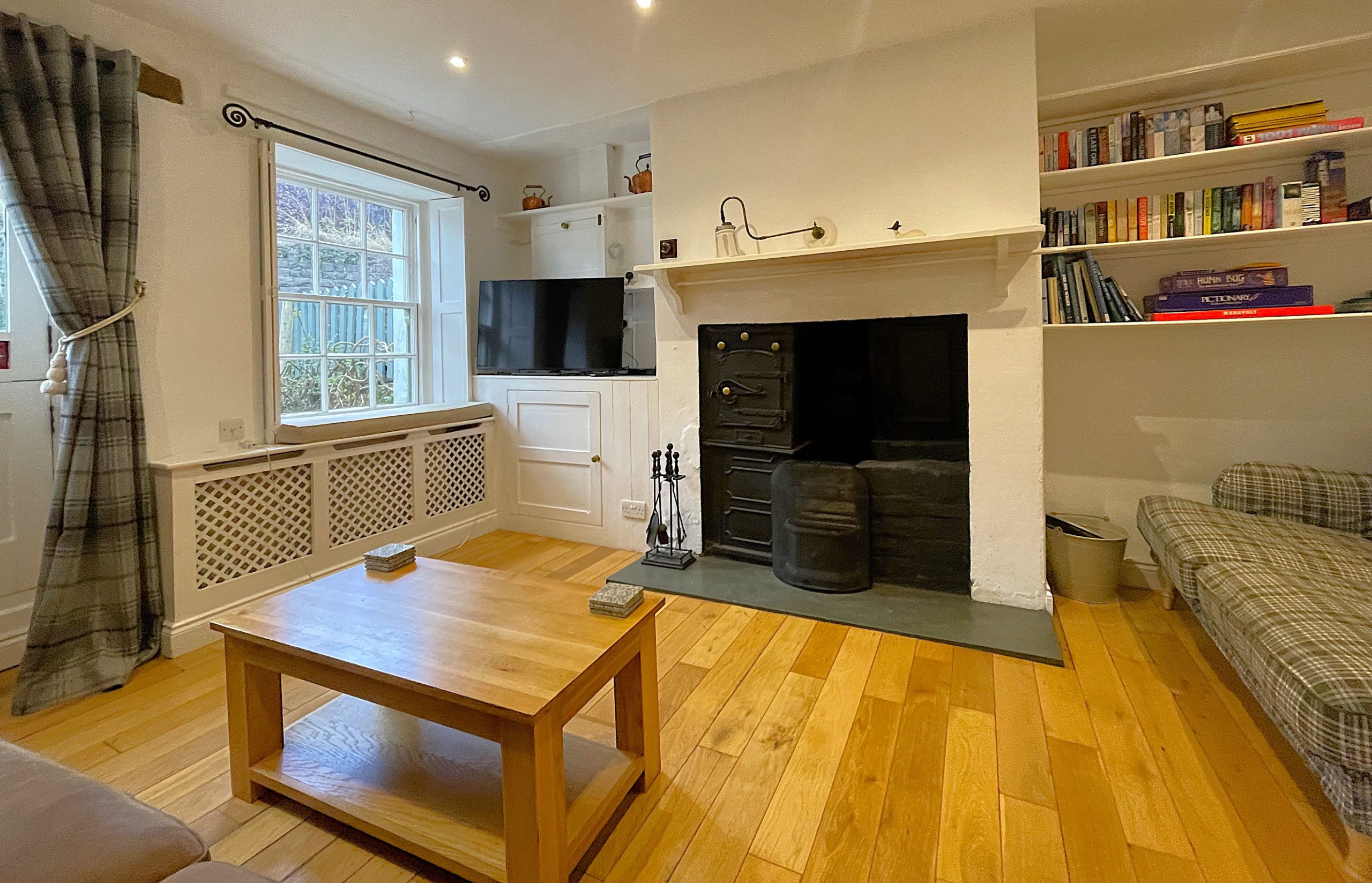 The window seat is the perfect place to sit with your morning coffee and watch the world go by