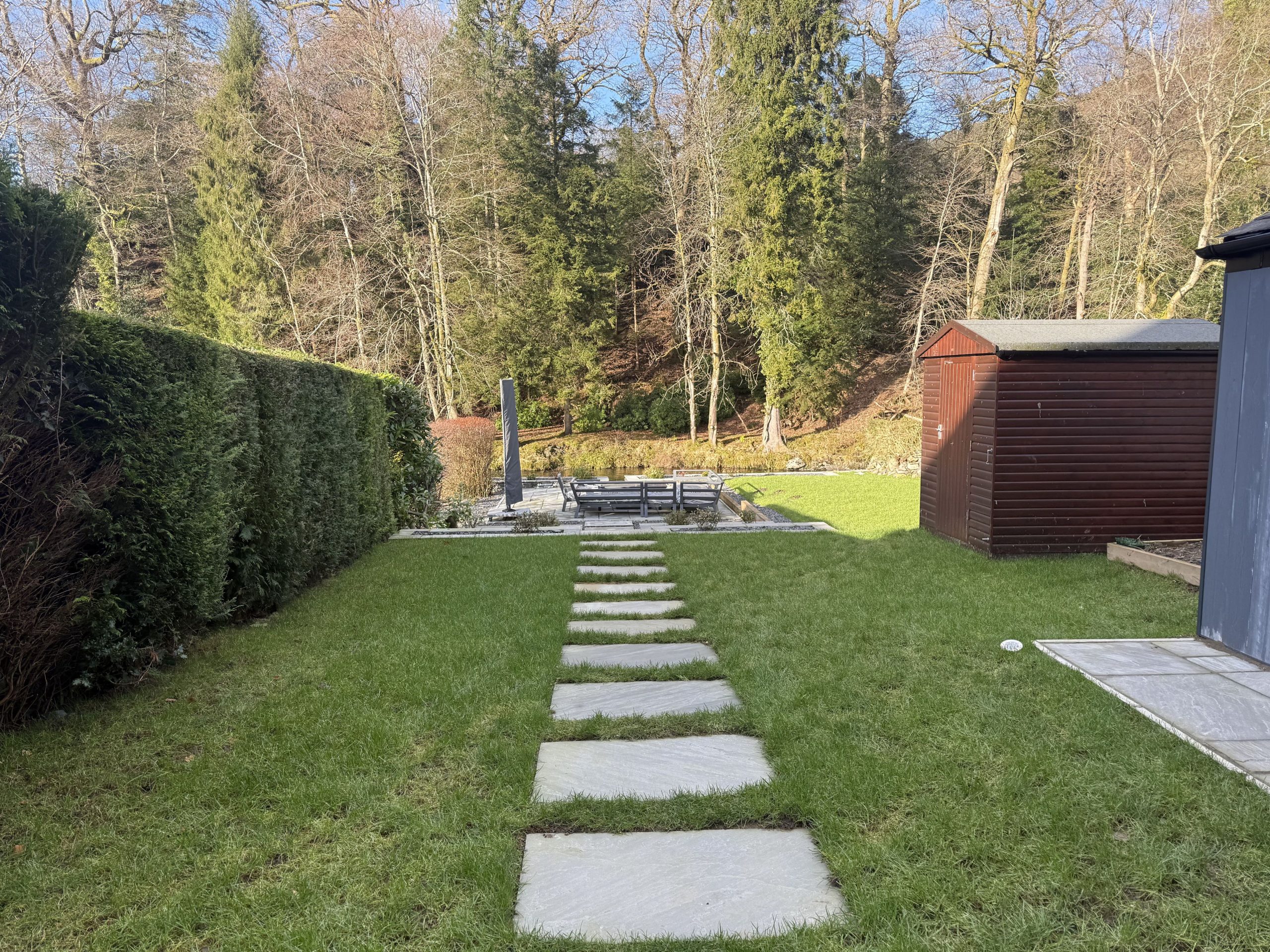 you will find an outdoor kitchen area to your left, perfect for the Summer months.