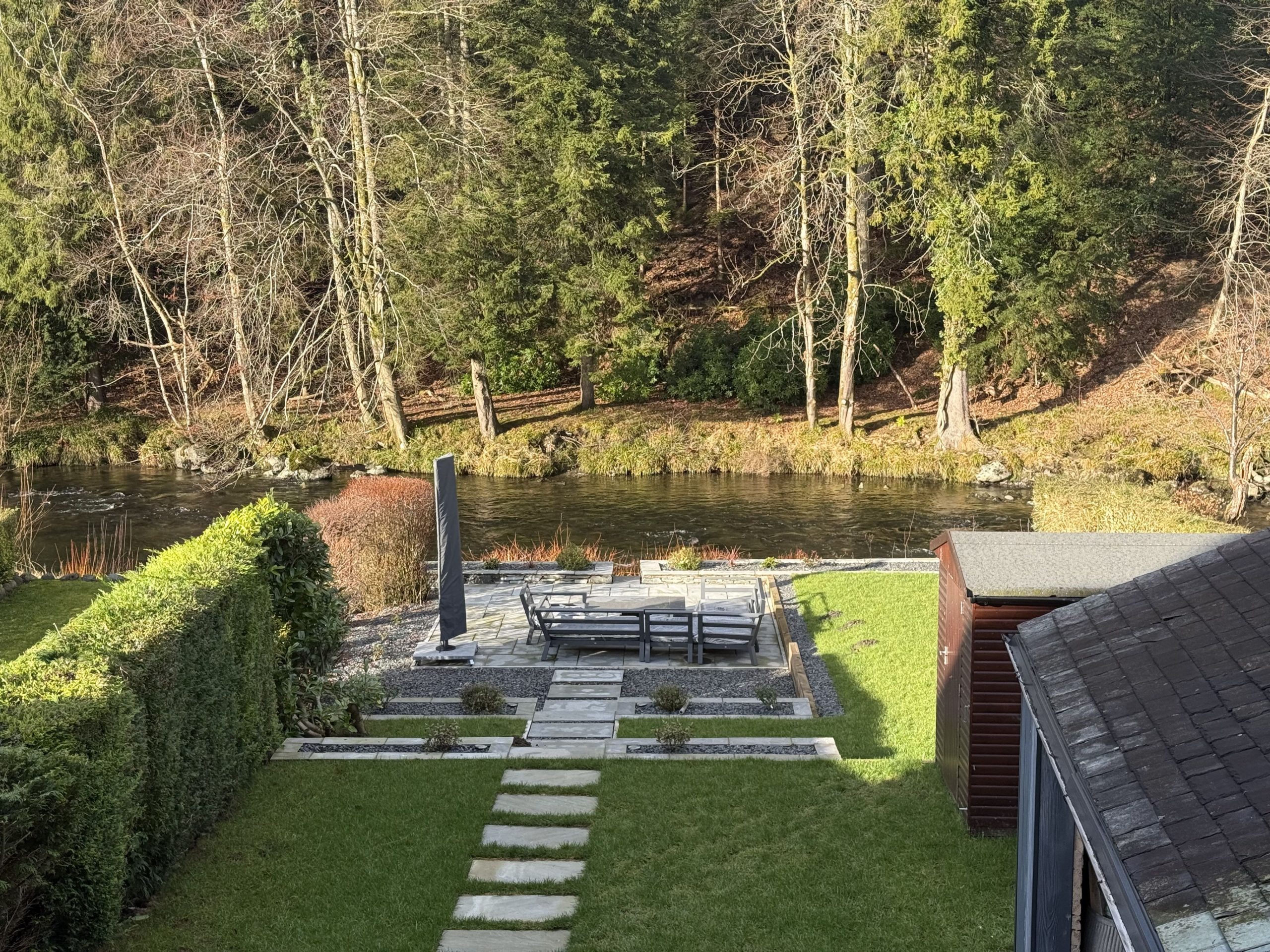 Enjoy relaxing in the garden overlooking the River Greta