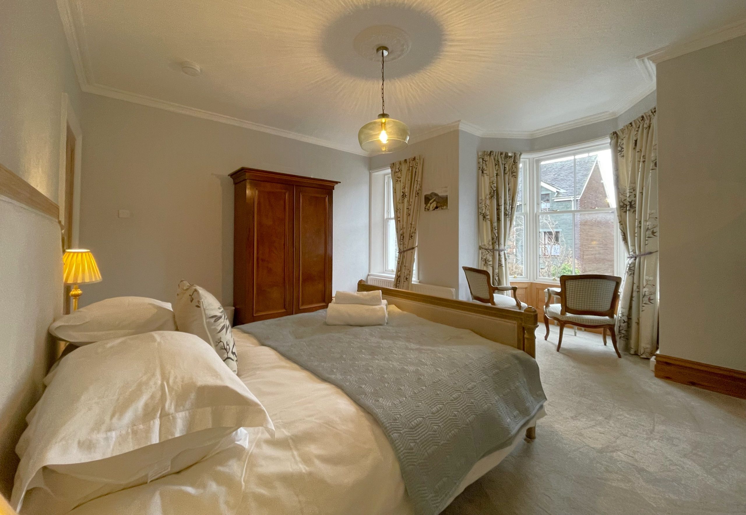 The large bay window lets in lots of natural light