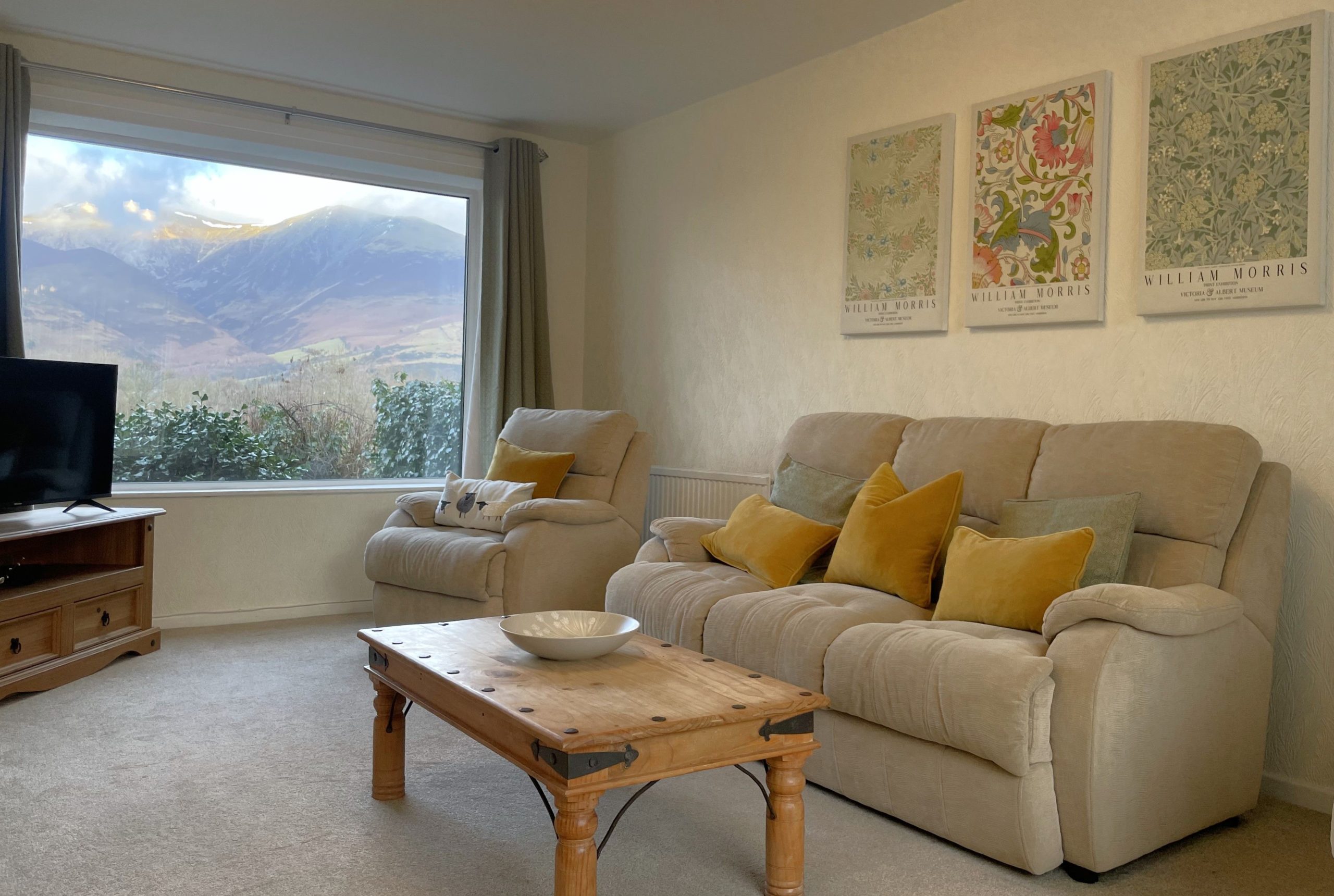 Here there is another large picture window with fabulous views over to mighty Skiddaw.