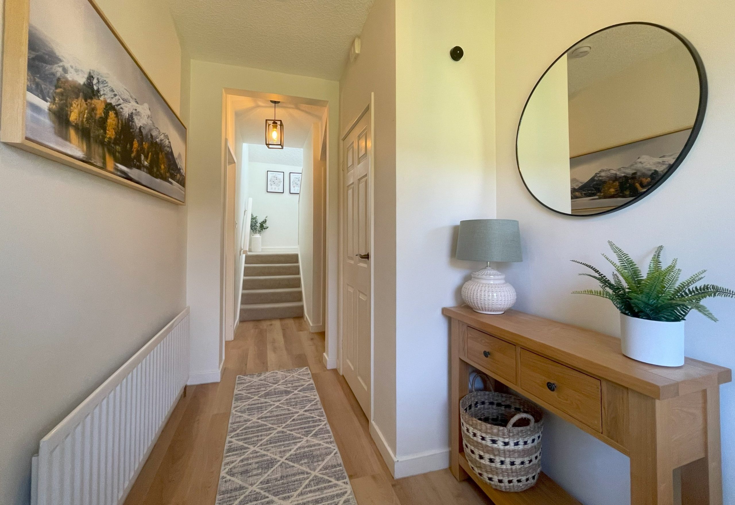 Welcoming hallway as you enter the property