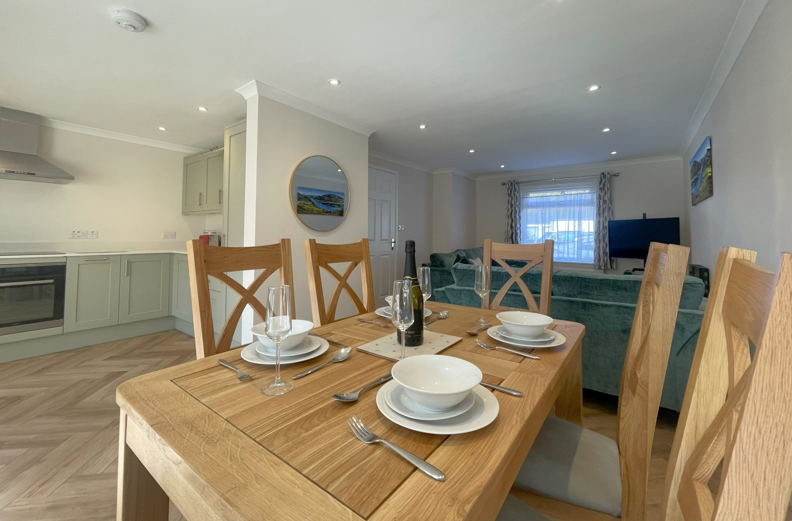 The dining room table can sit 6 comfortably.