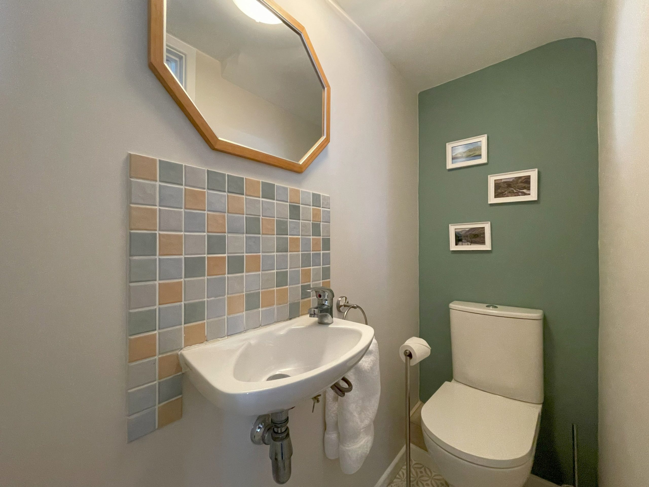 To the end of the hallway is the downstairs WC.