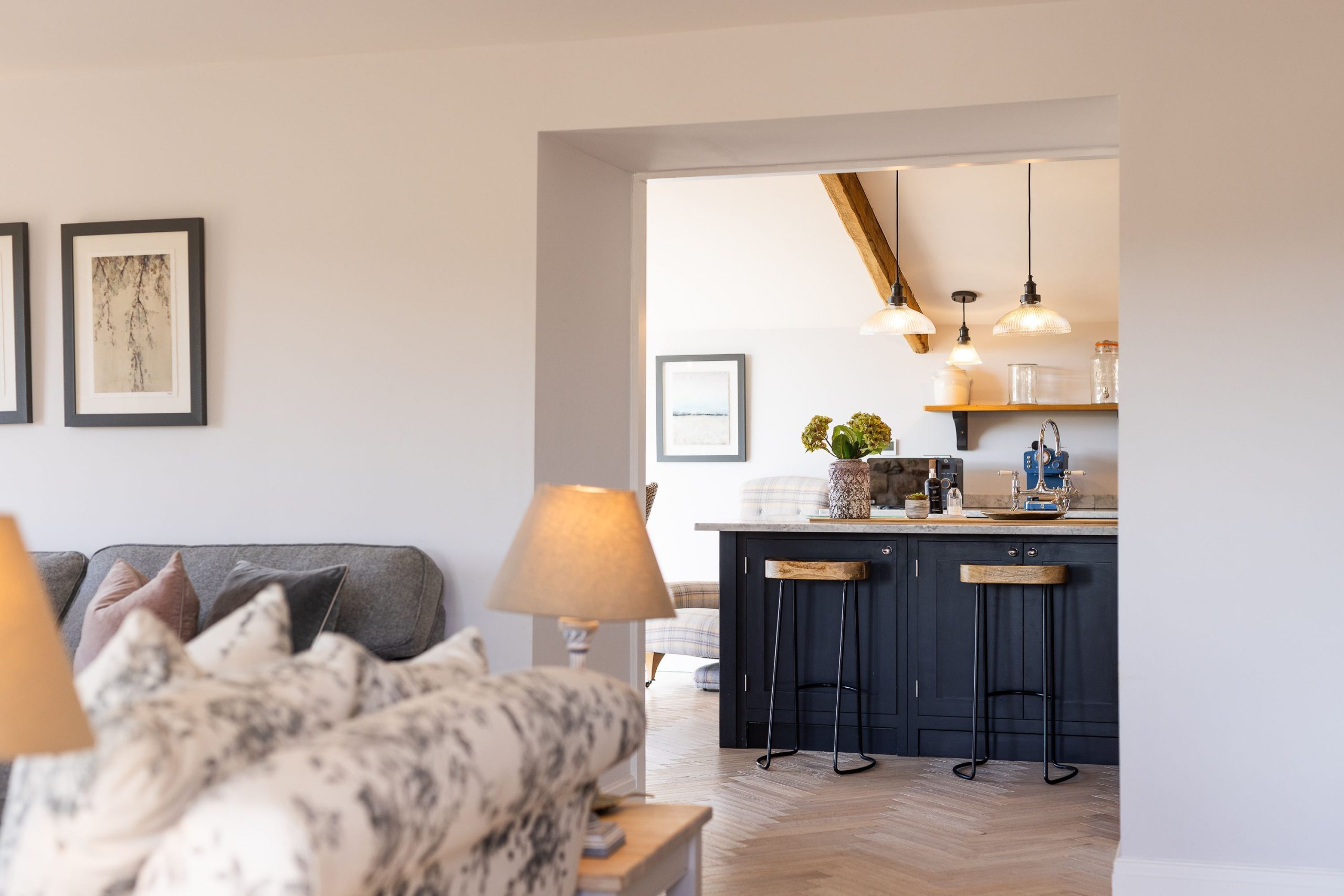 You can keep an eye on your chef as you relax on the sofa