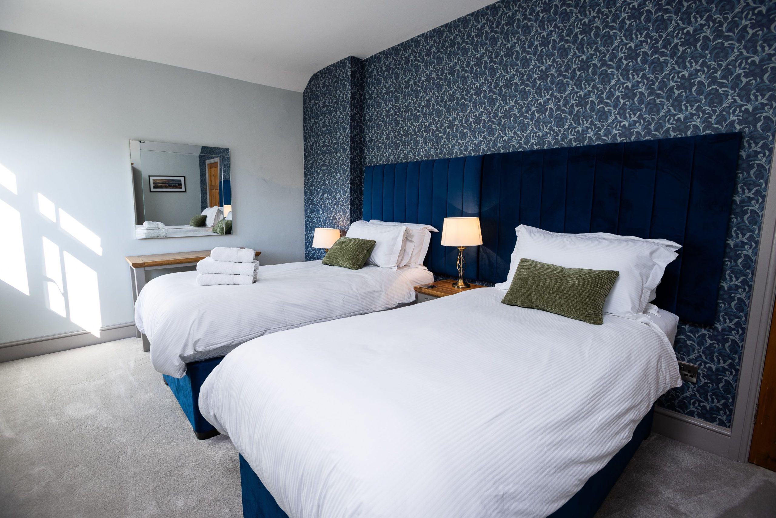 The spacious twin bedroom 