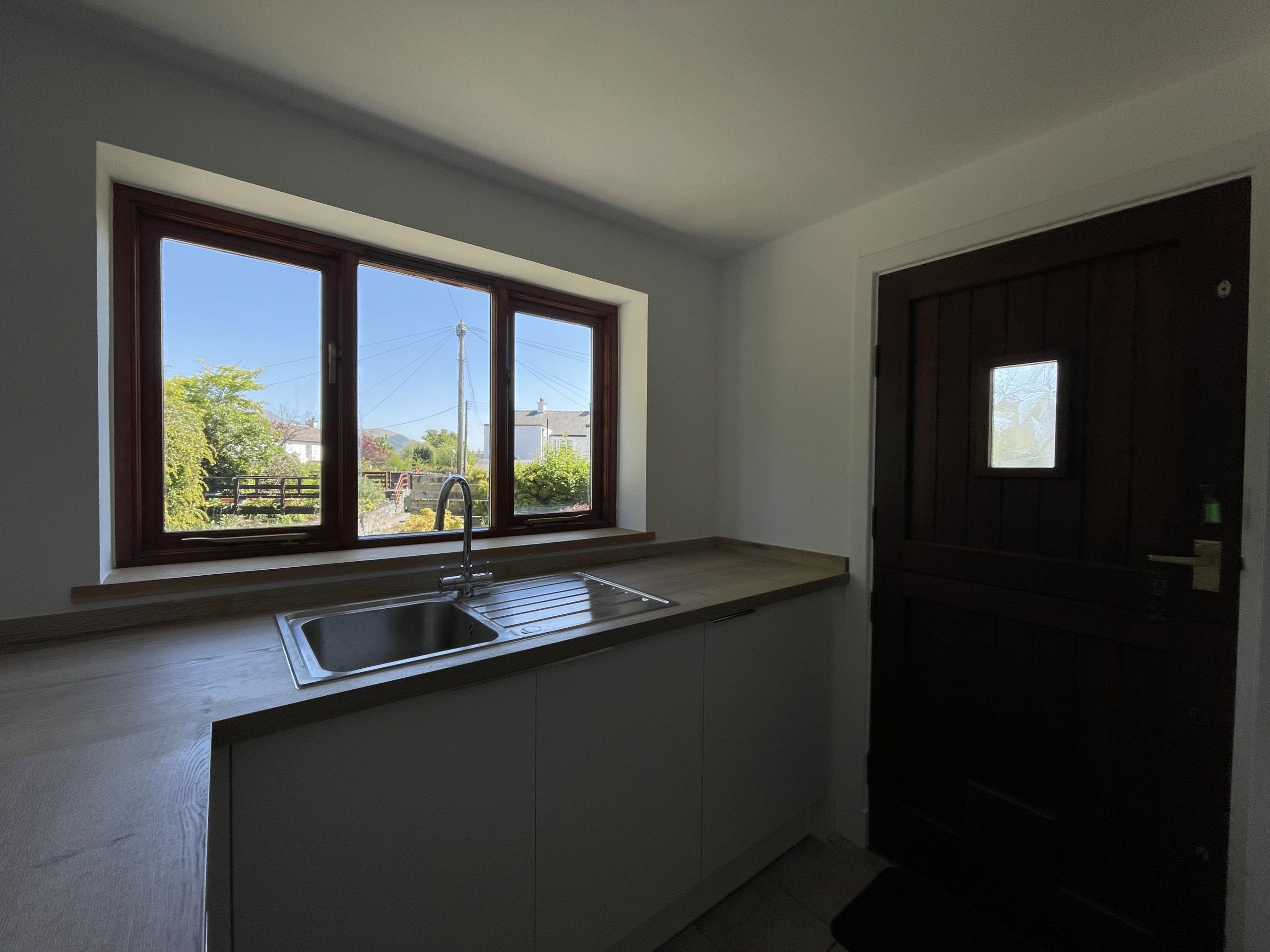 The utility room is spacious and great for dealing with muddy boots!