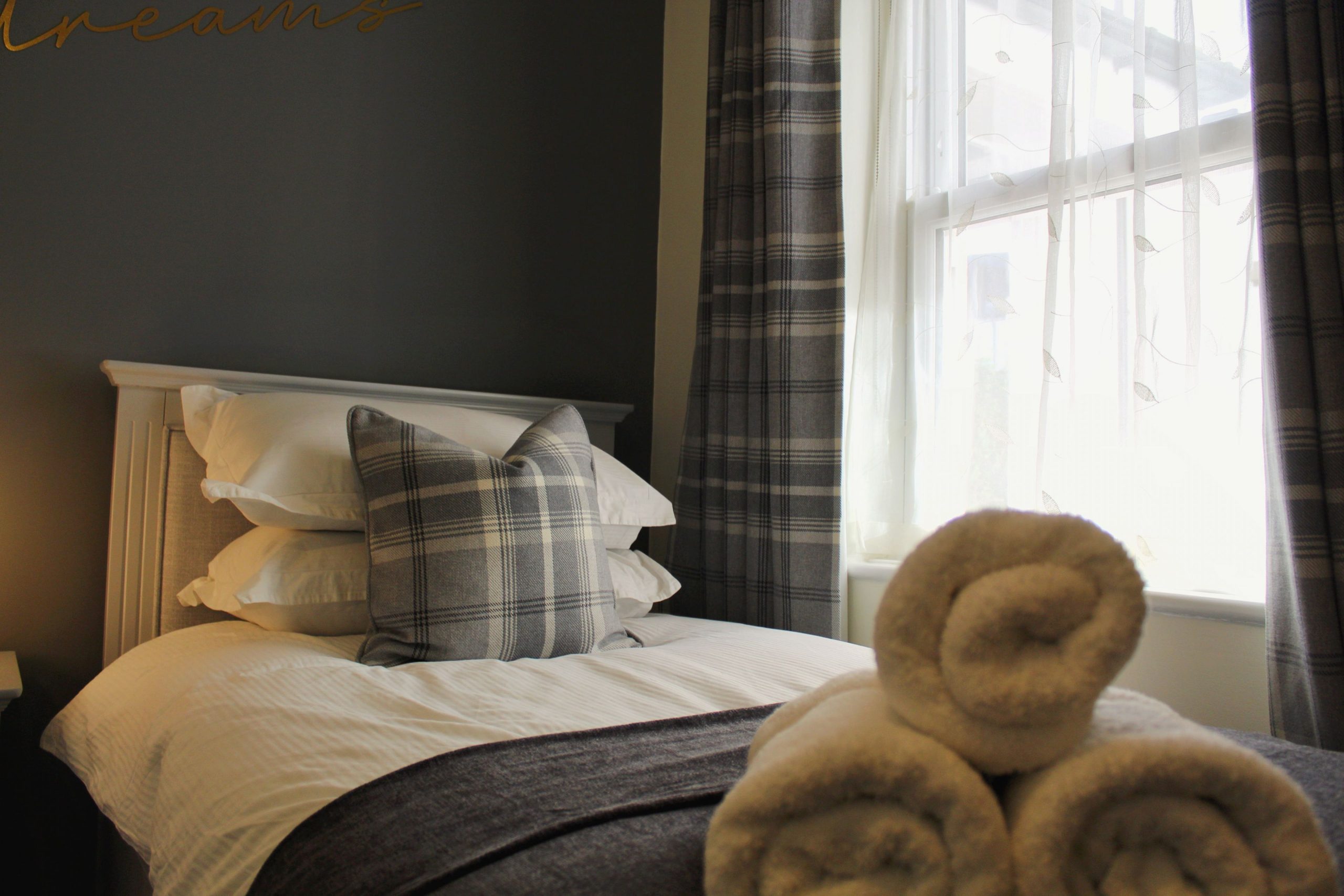 Fresh, crisp linens and plush towels are provided.