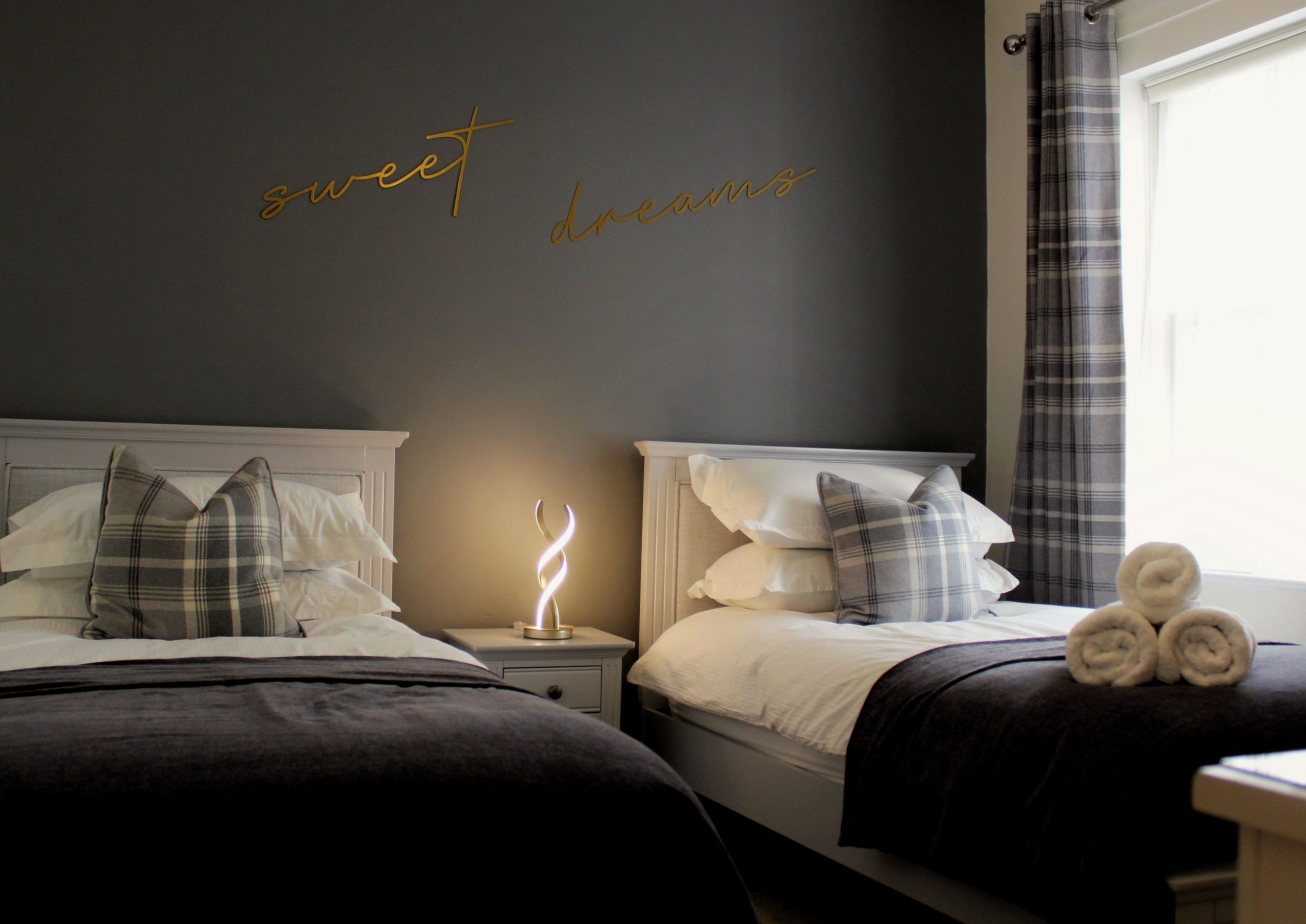 Modern twin bedroom, perfect for families and friends visiting the Lake District.