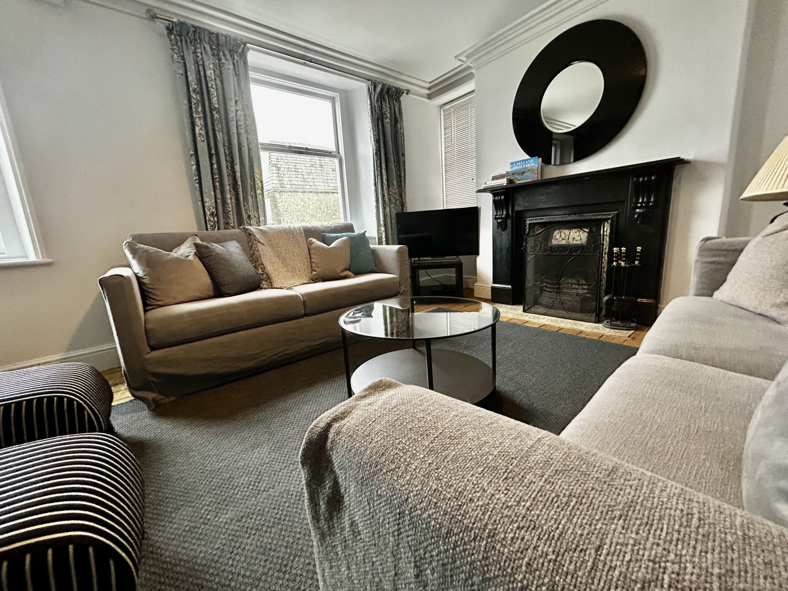 With NEW sofas, unwind in the spacious living room.