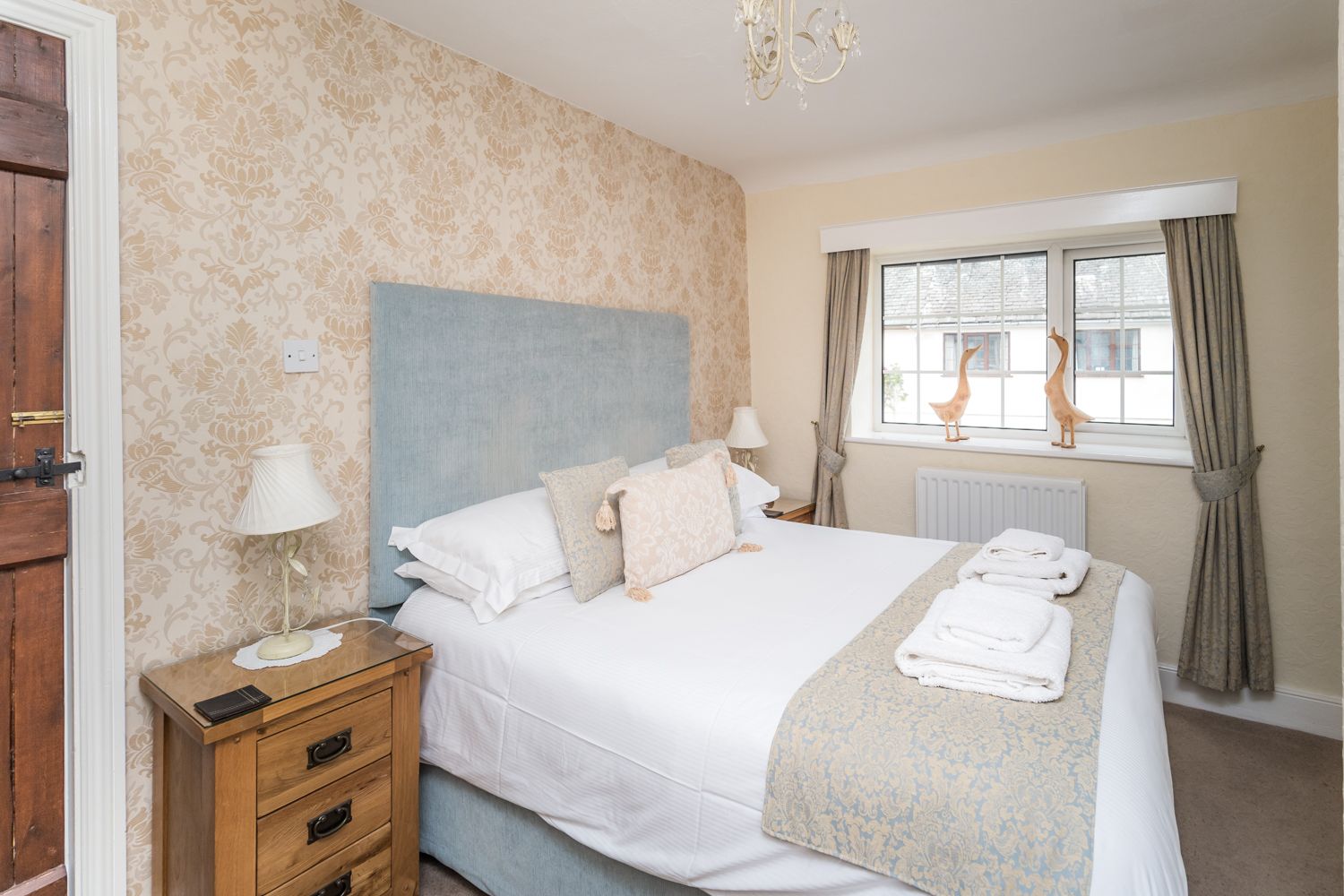 The master bedroom features a king size bed 