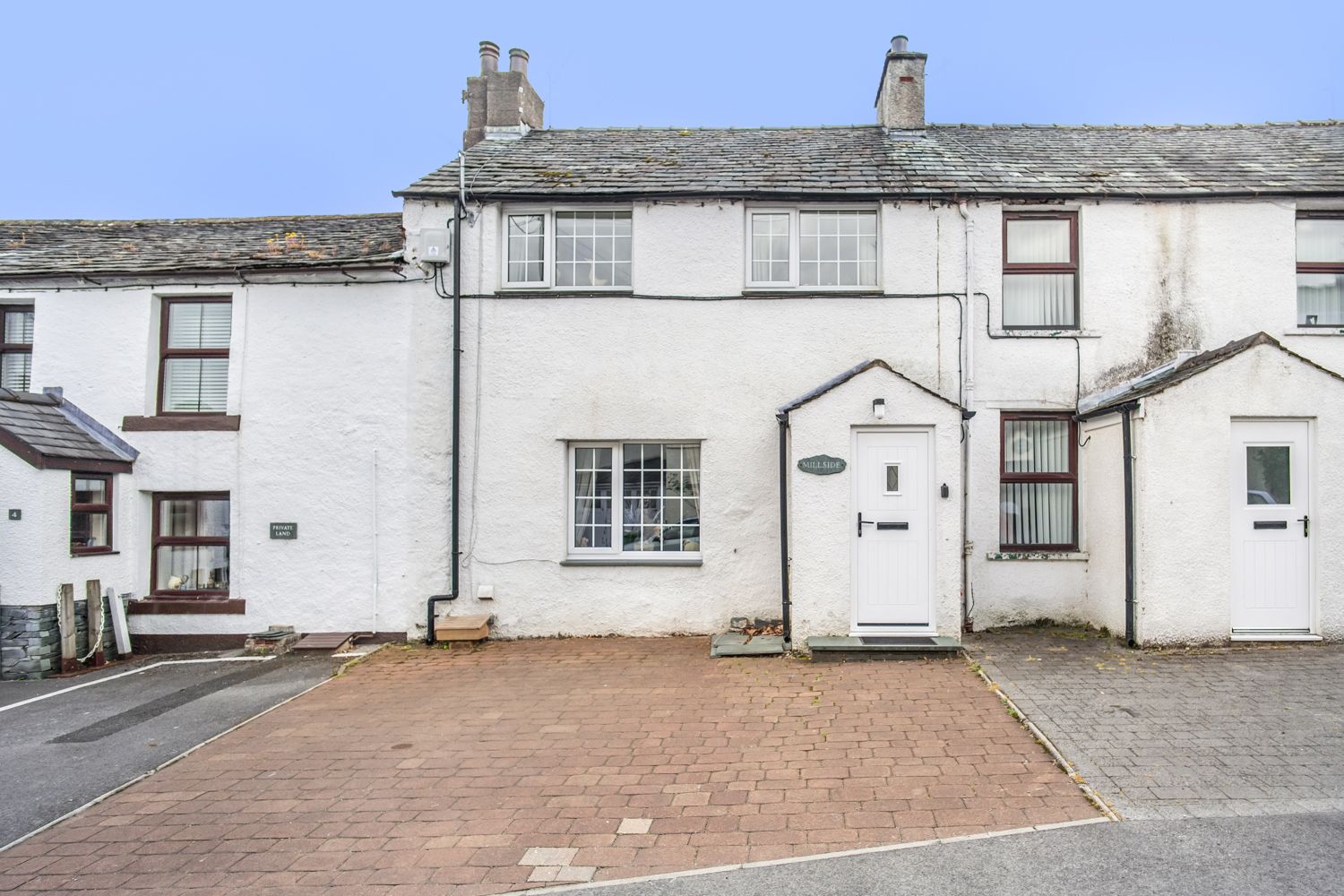 To the front of the property are 2 private parking spaces