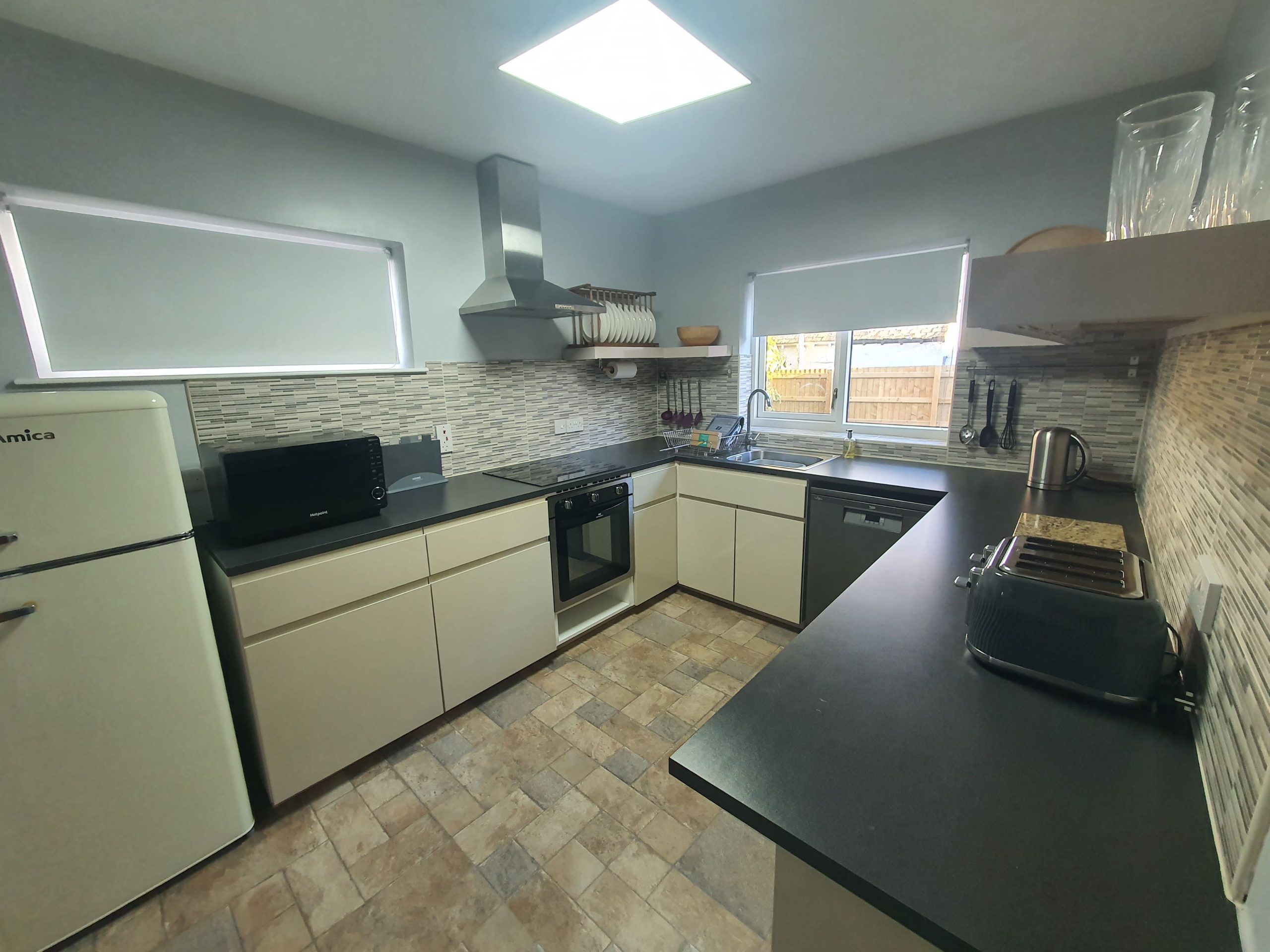 From the kitchen you can access the utility area and the downstairs WC