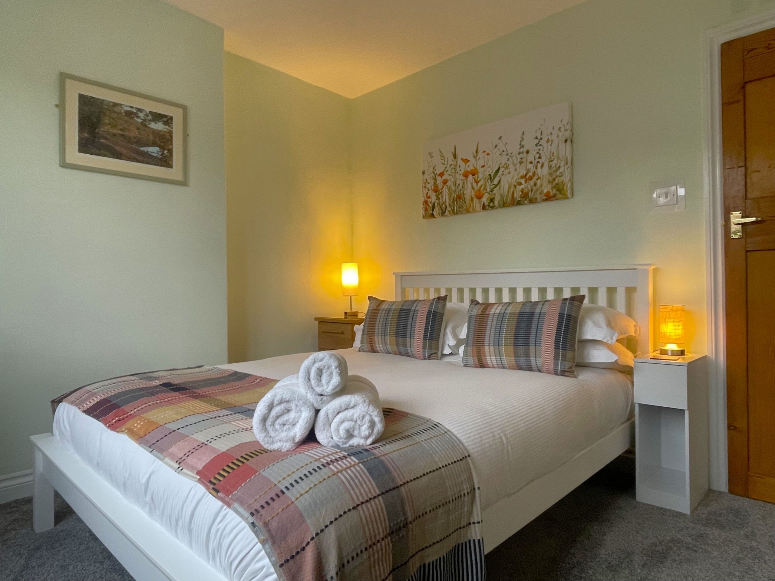 A spacious master bedroom is the perfect place to relax after a day exploring Keswick