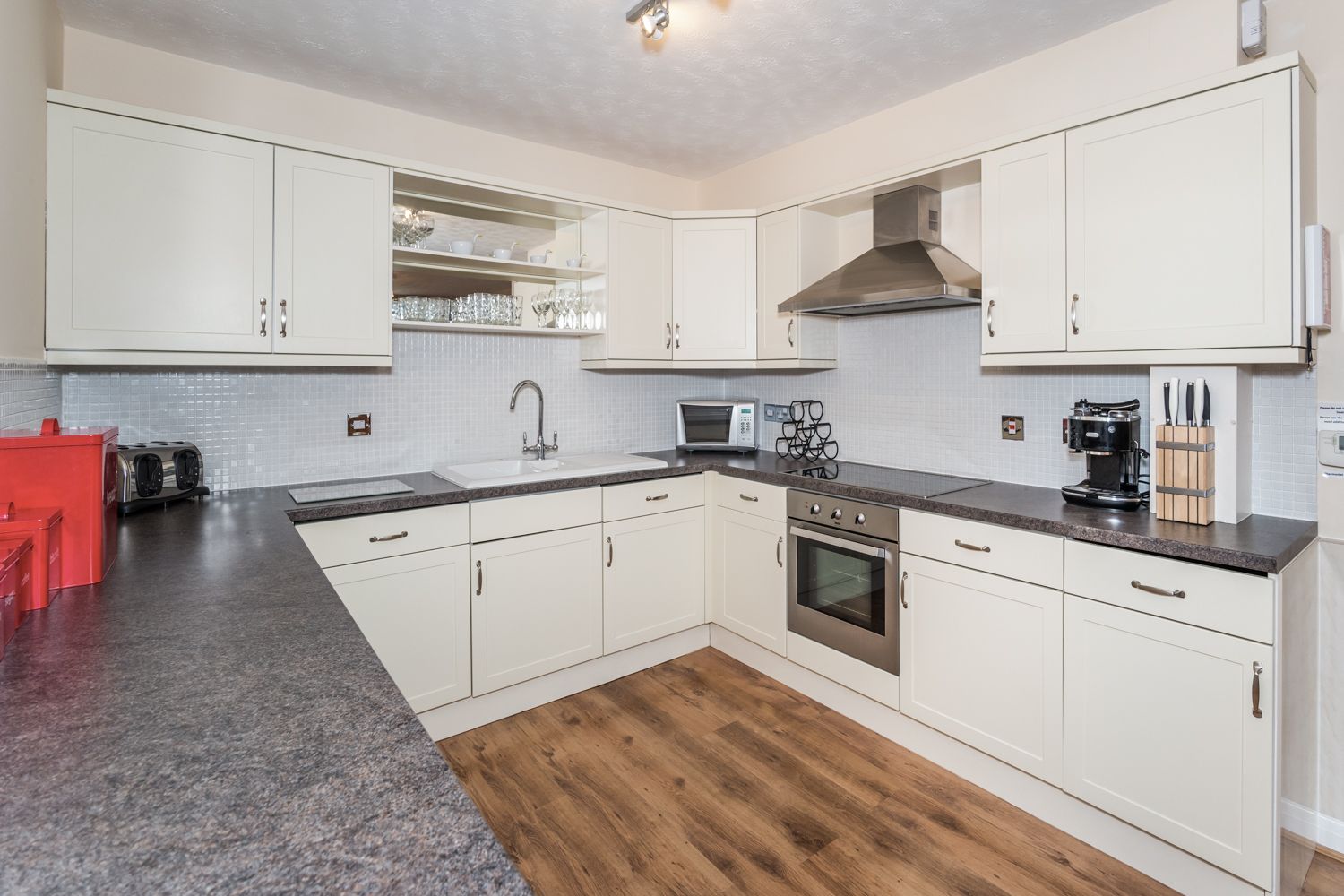 The kitchen is equipped with  ceramic hob, oven, fridge, freezer, dishwasher, washing machine and lots of cupboard space
