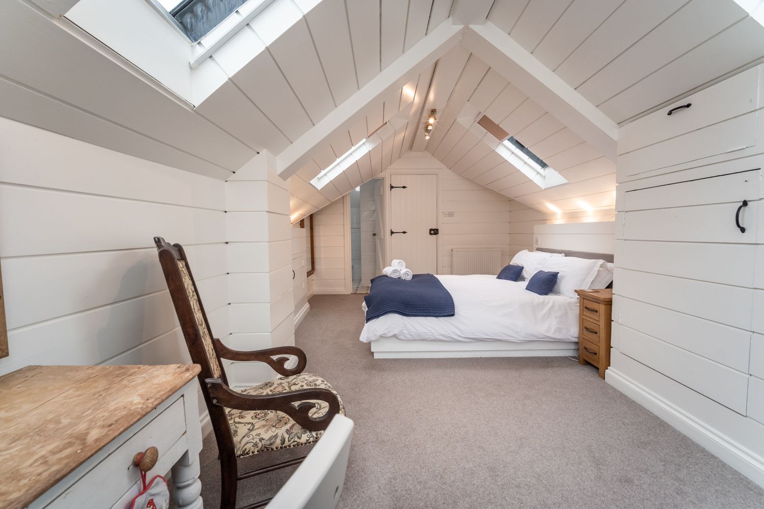 This room features rooflights with fantastic views across Portinscale and on to Skiddaw