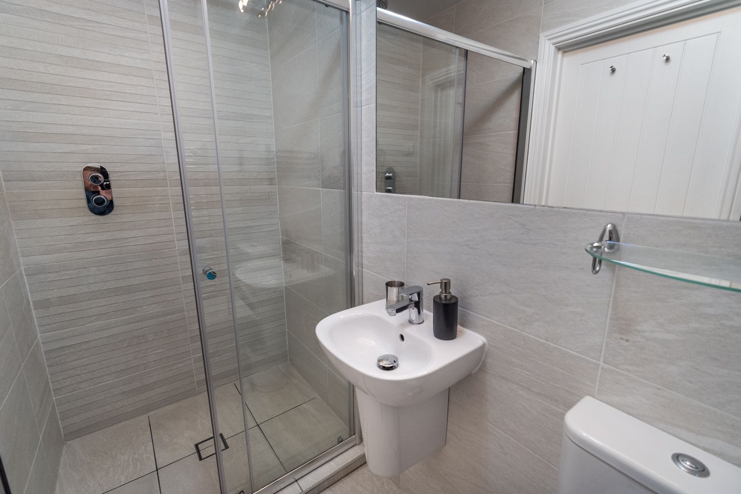 The master suite benefits from an ensuite shower room