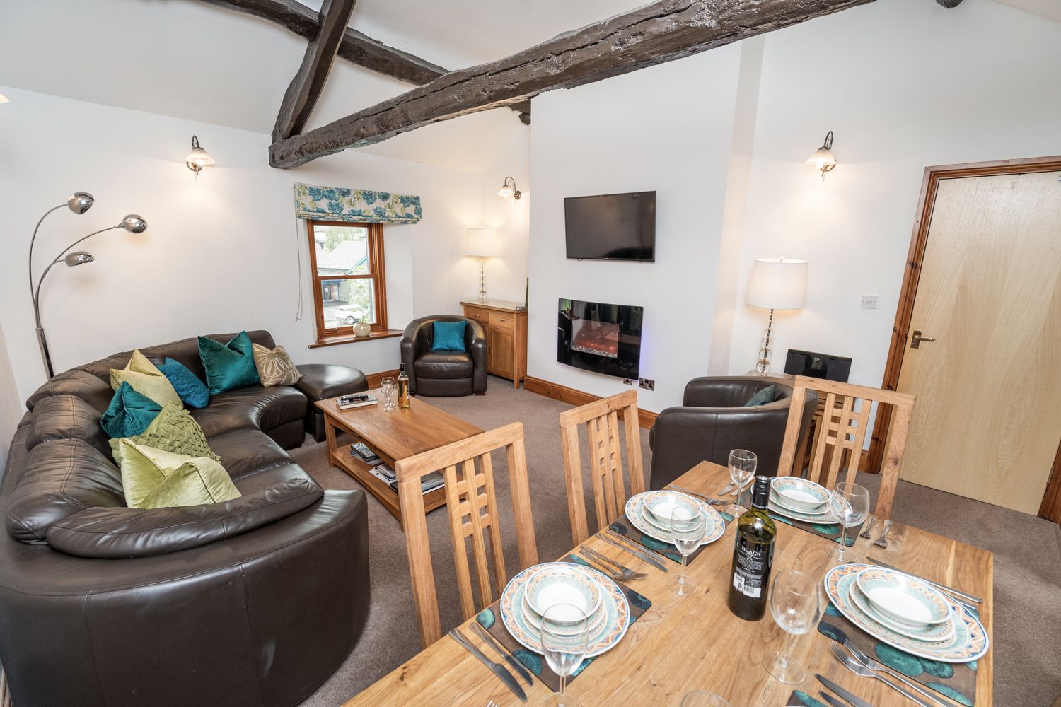 Snuggle up on the sofa on the rainy days and watch your favourite shows in front of the fire