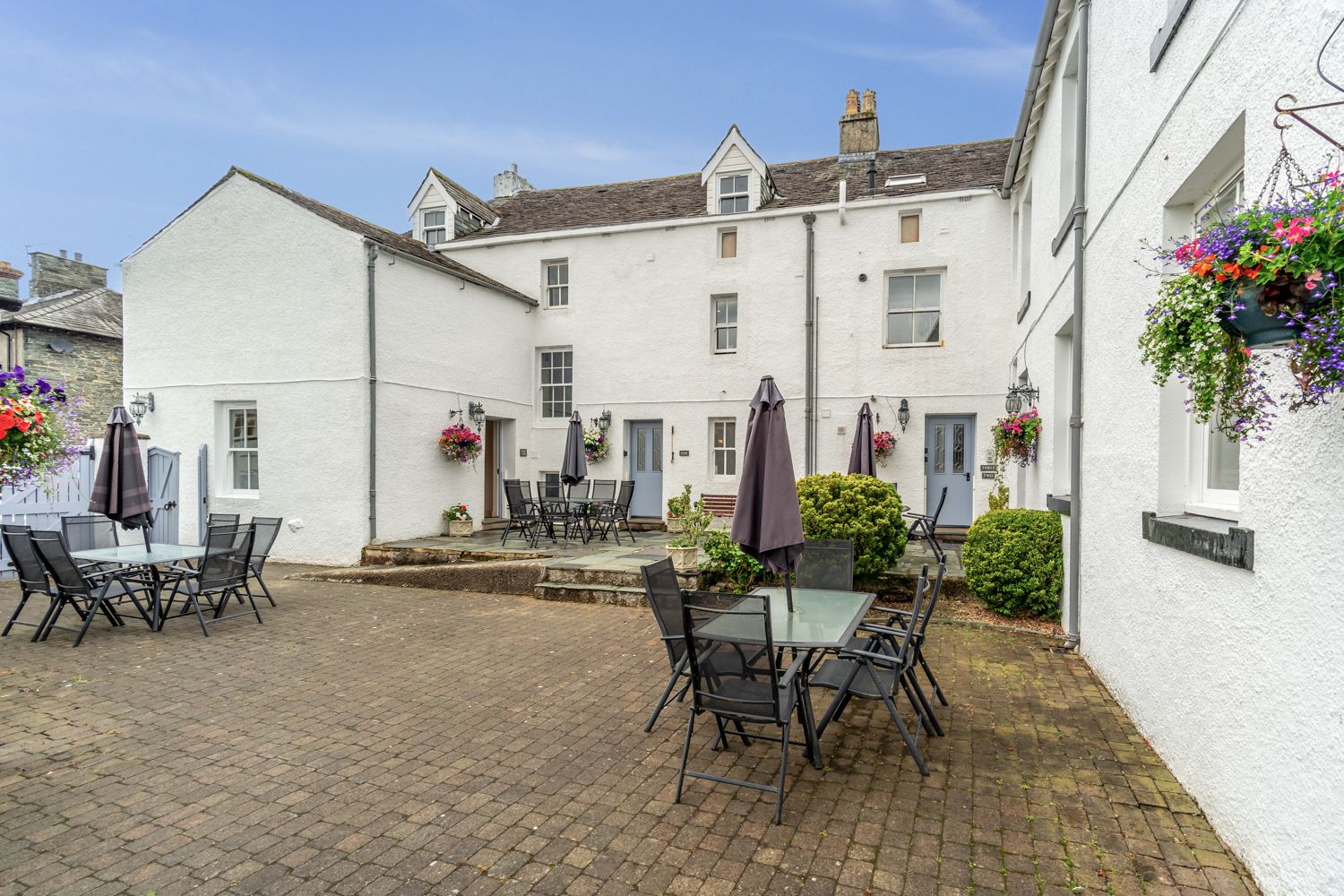 A choice of seating areas in the shared courtyard
