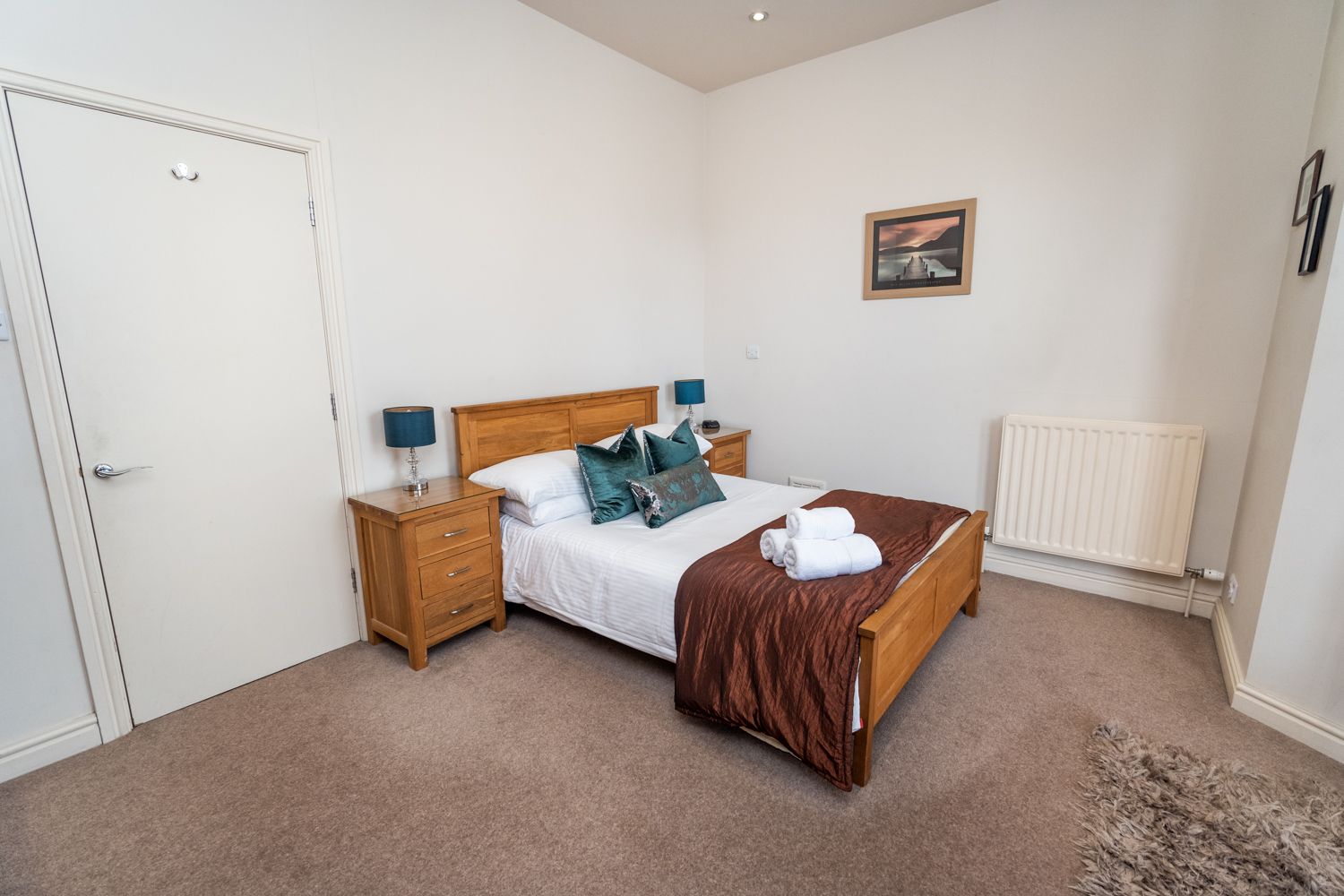 A large double bedroom on the 1st floor of the property