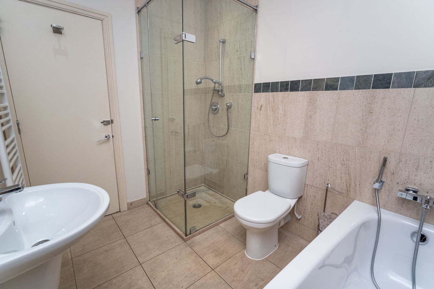 The bathrooms are tastefully decorated and spacious