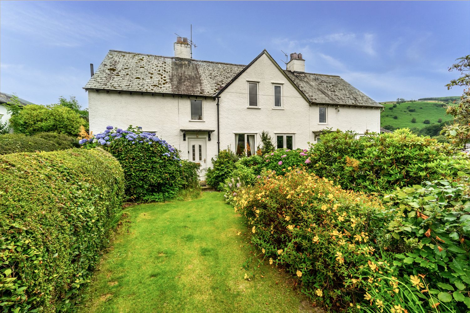 Rose Bank Cottage is on the left hand side of the building