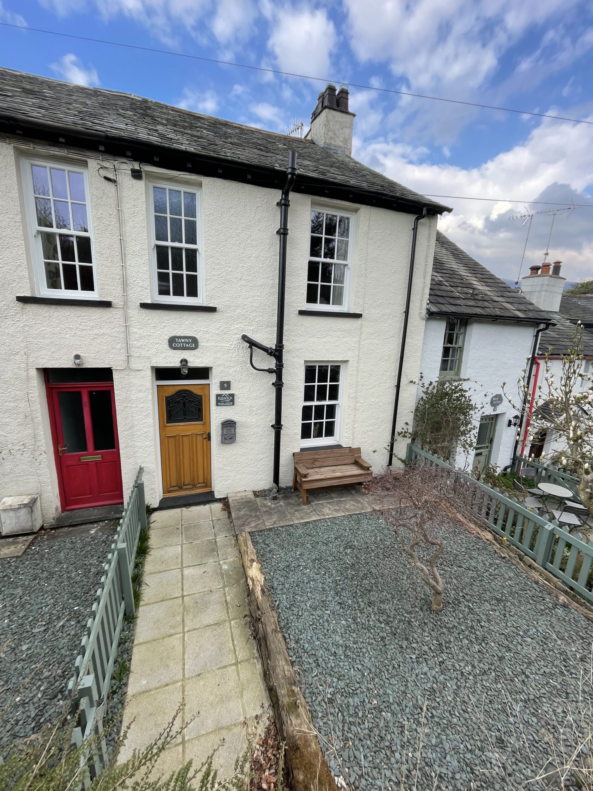 At the front of the property you can find a lovely patio with seating area