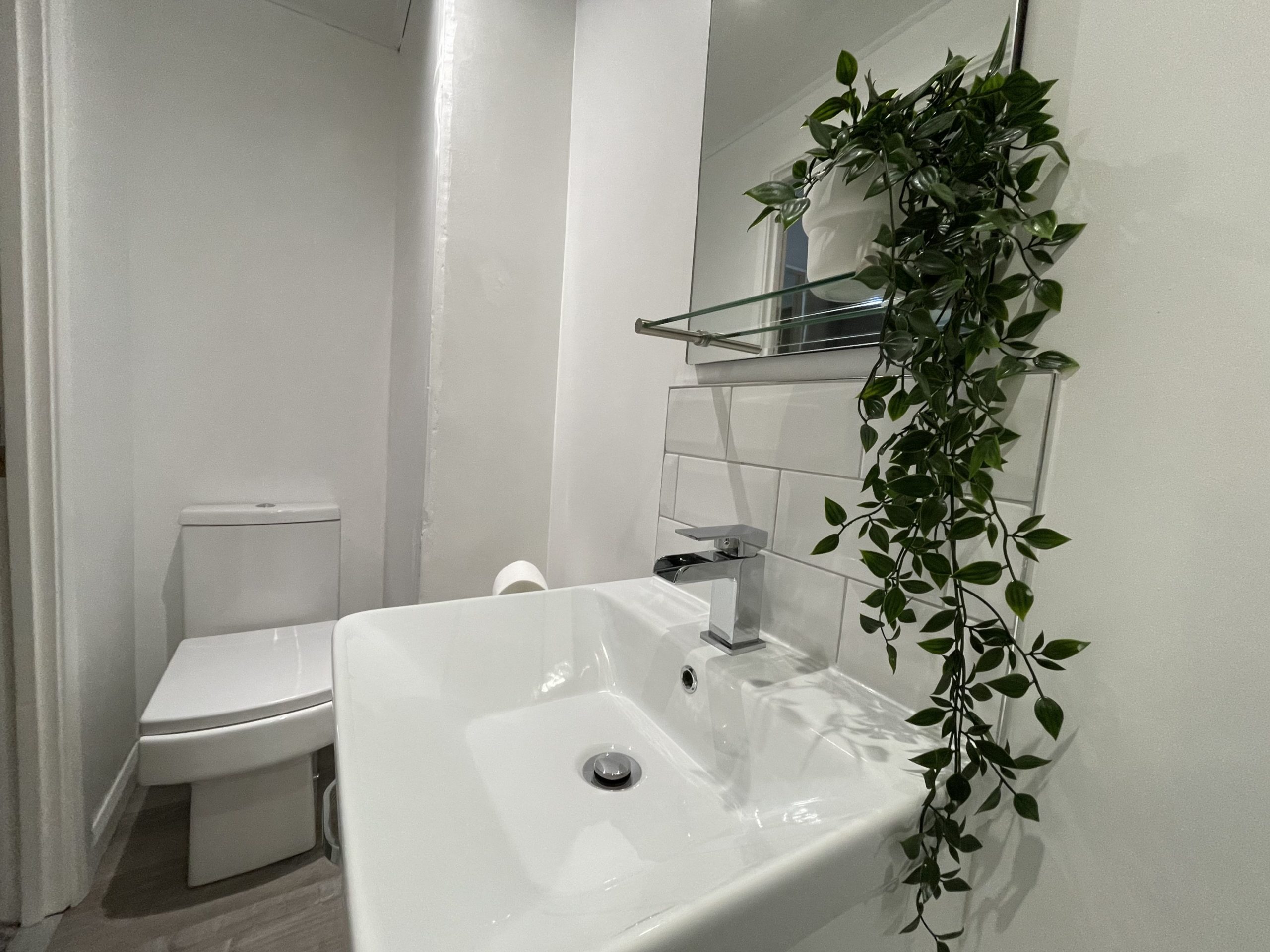 The ensuite comprises walk in shower, WC and hand basin