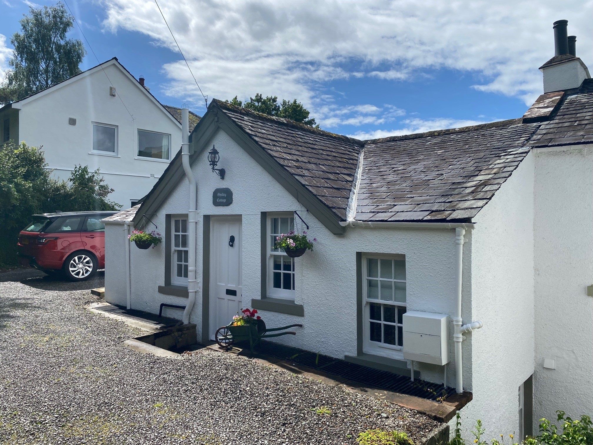 You will find a private allocated parking space to the left of the property and a second car can also park in the garage
