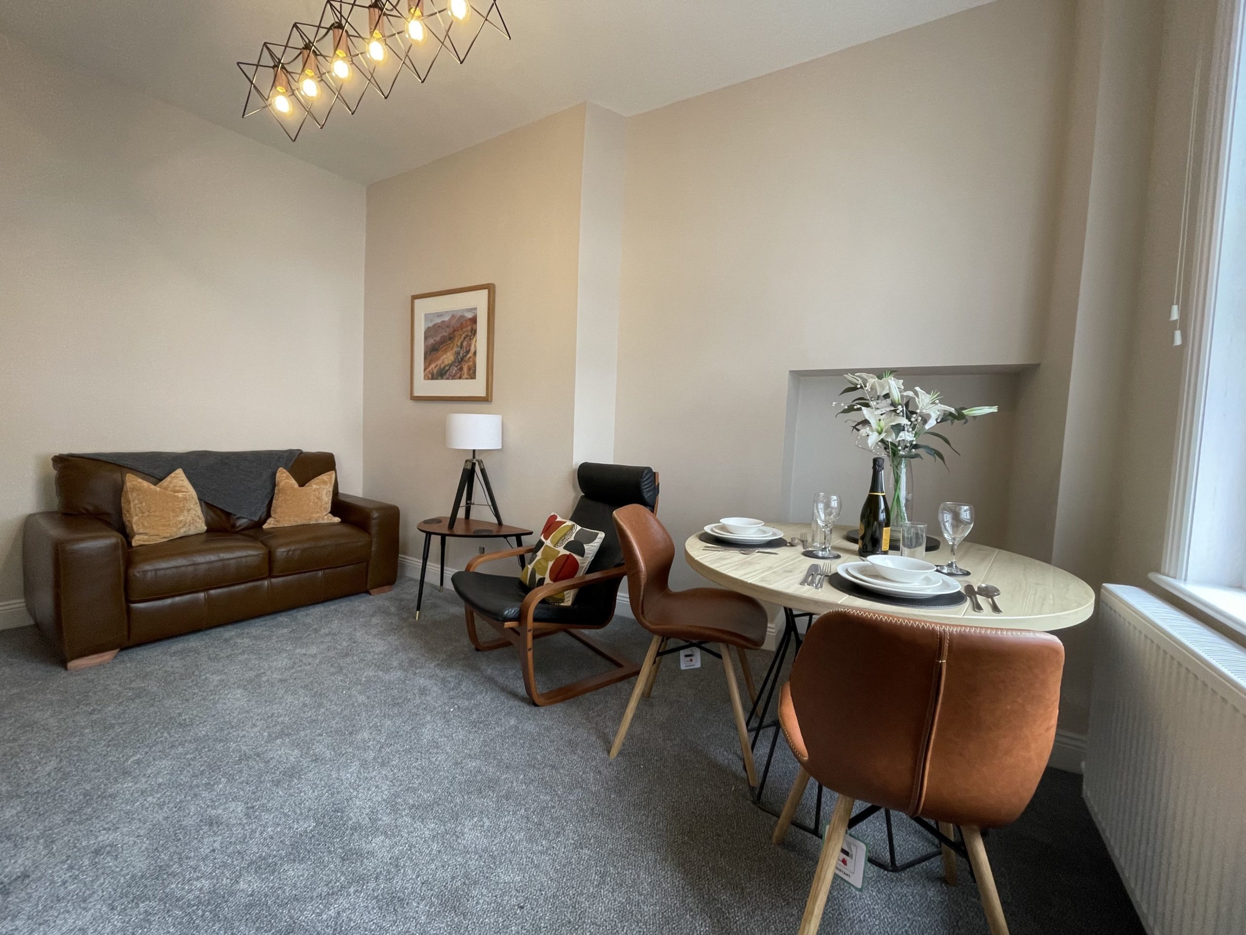 Enjoy the view from the large windows which look out over the main highstreet