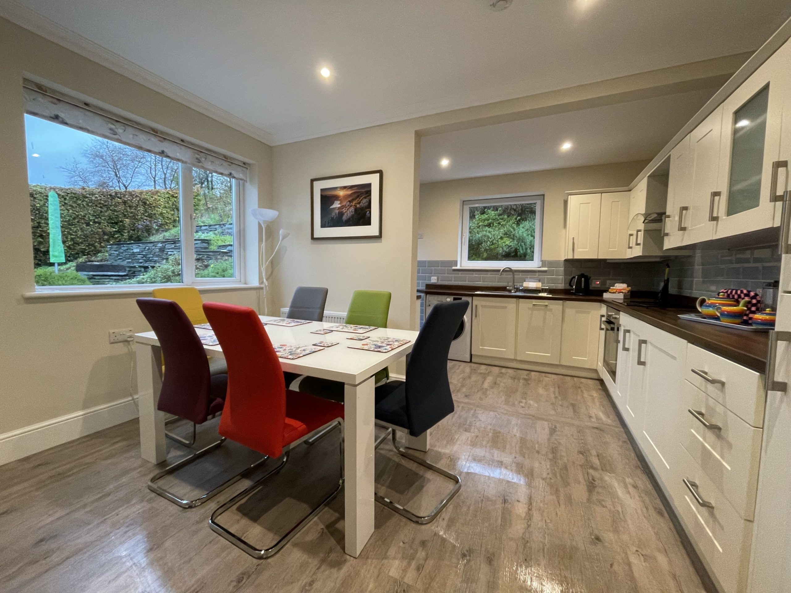 The kitchen/dining area is a large space where everyone can enjoy a meal together