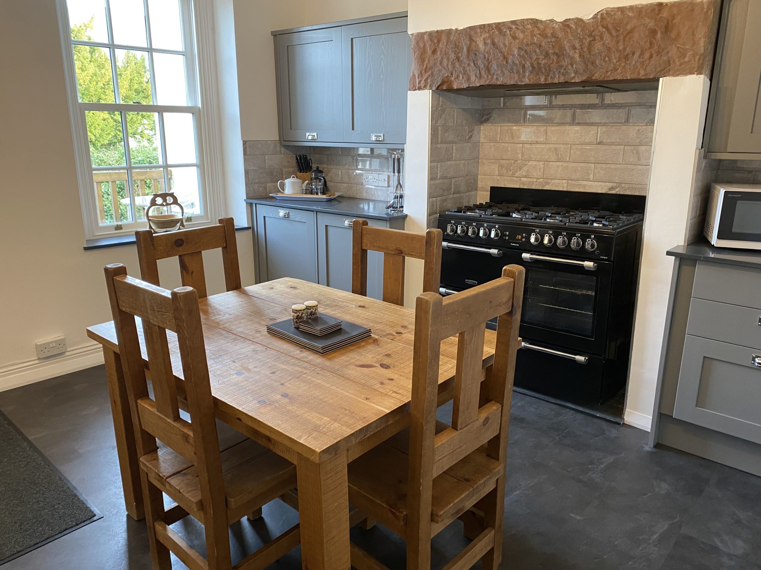 The entrance to Tawny Cottage opens into the lovely kitchen and dining area