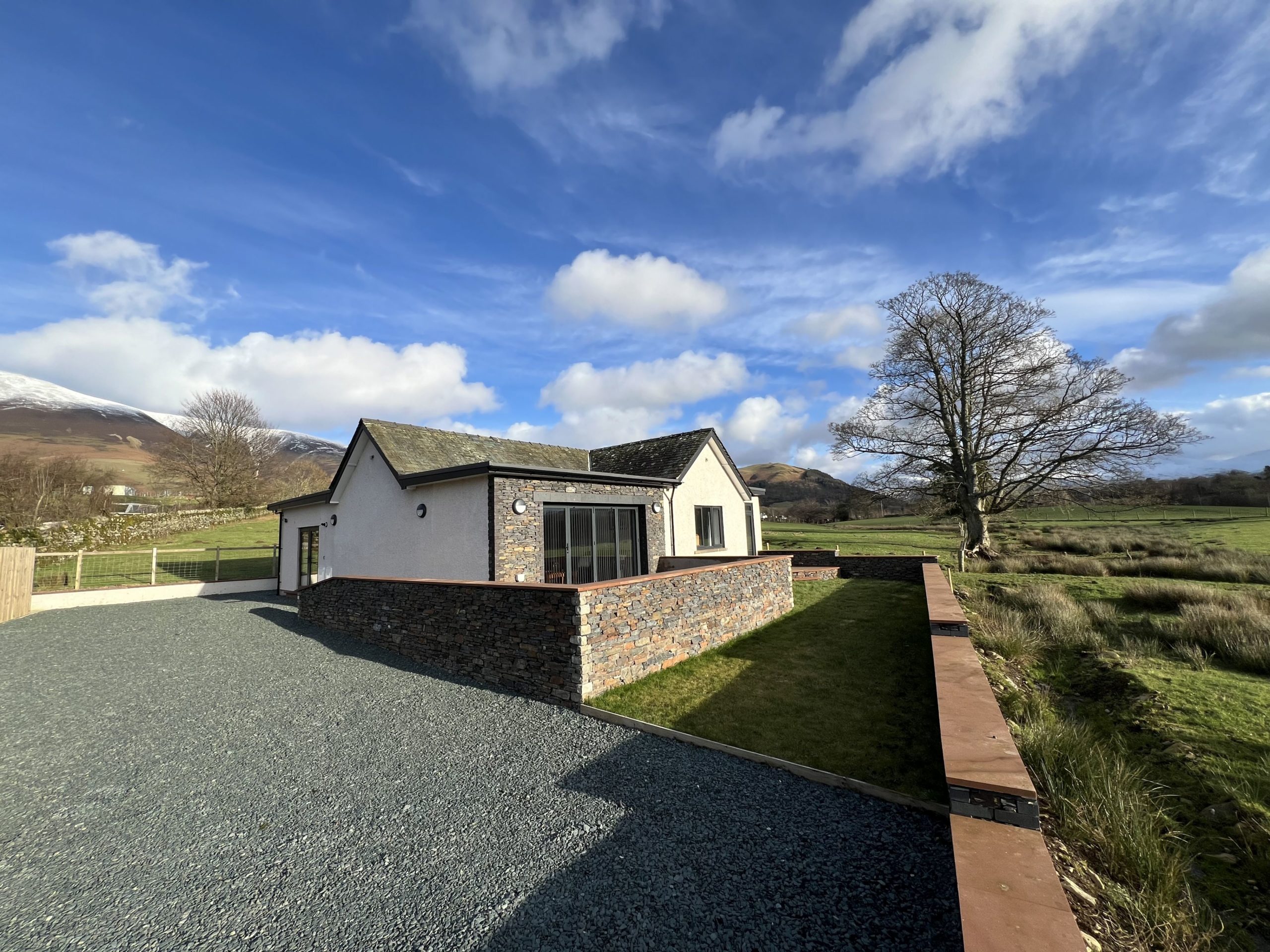 There is lots of space available for parking at Langrigg Cottage