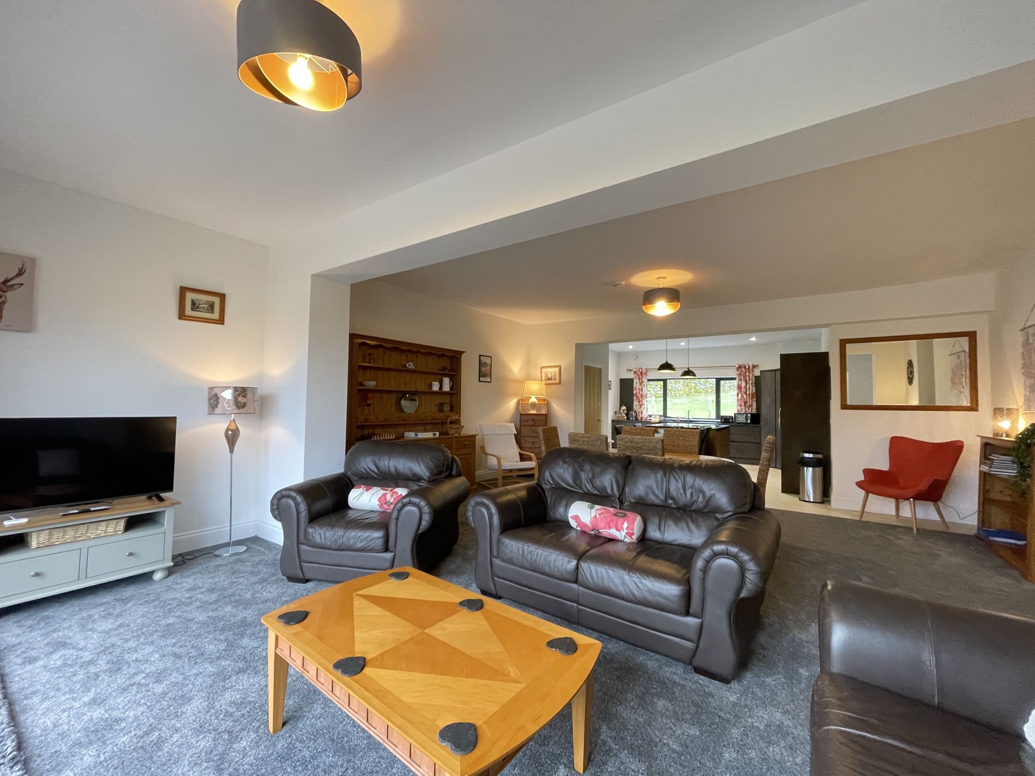 Enjoy your favourite shows on the large TV in the living area