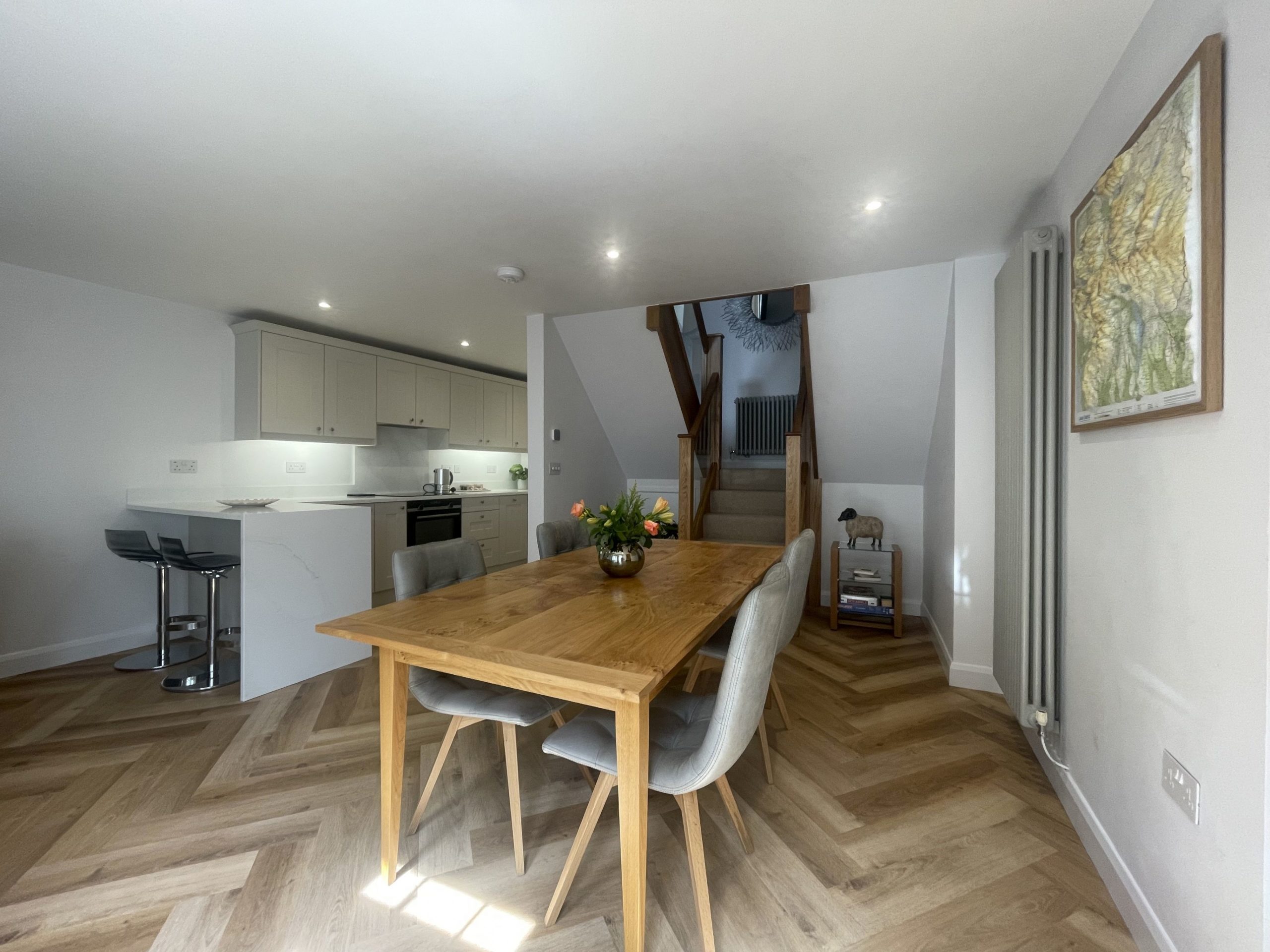 A large dining table gives plenty of space for breakfasts and dinners for all the family