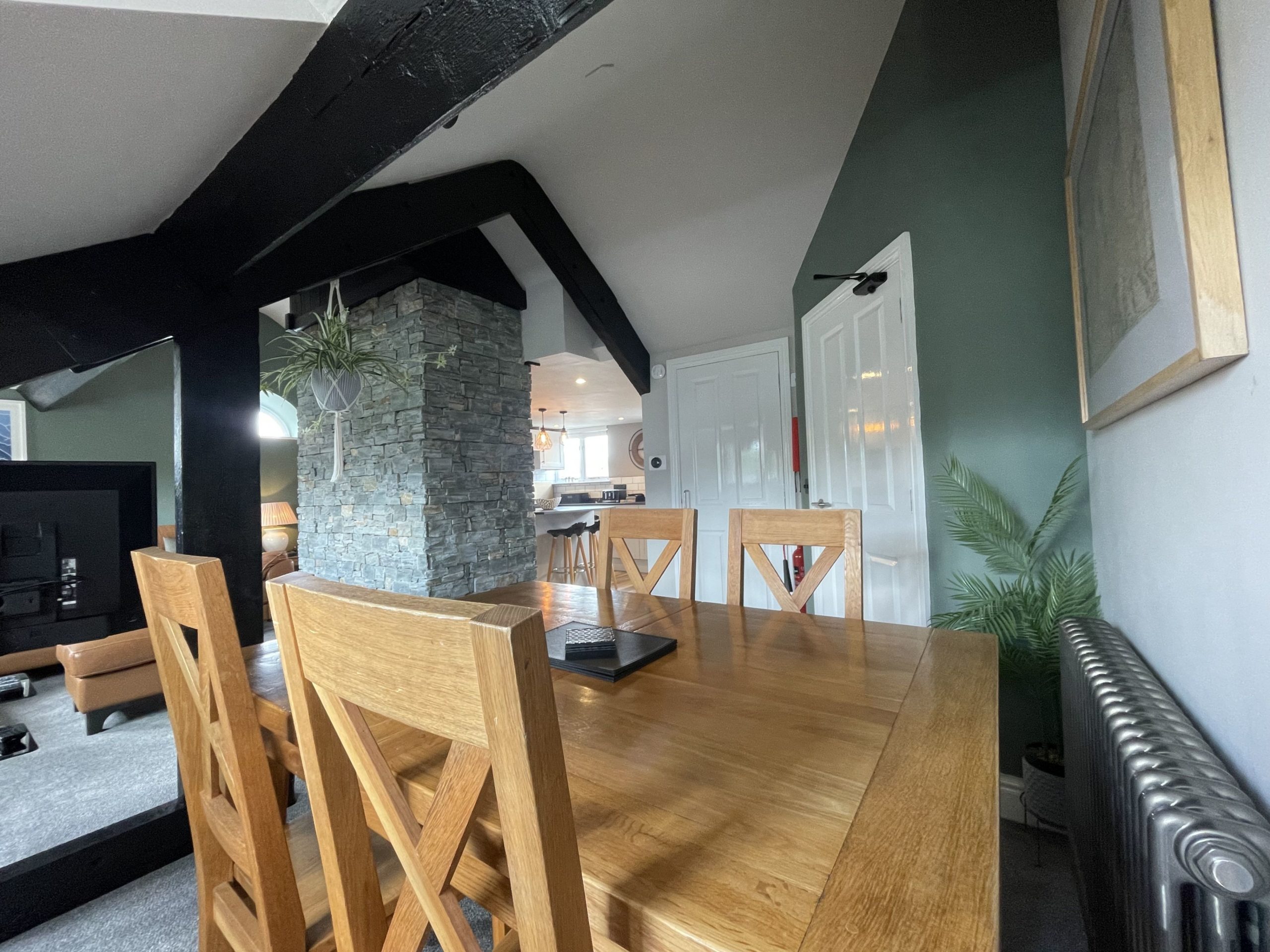 The apartment has an open plan living/dining and kitchen area 