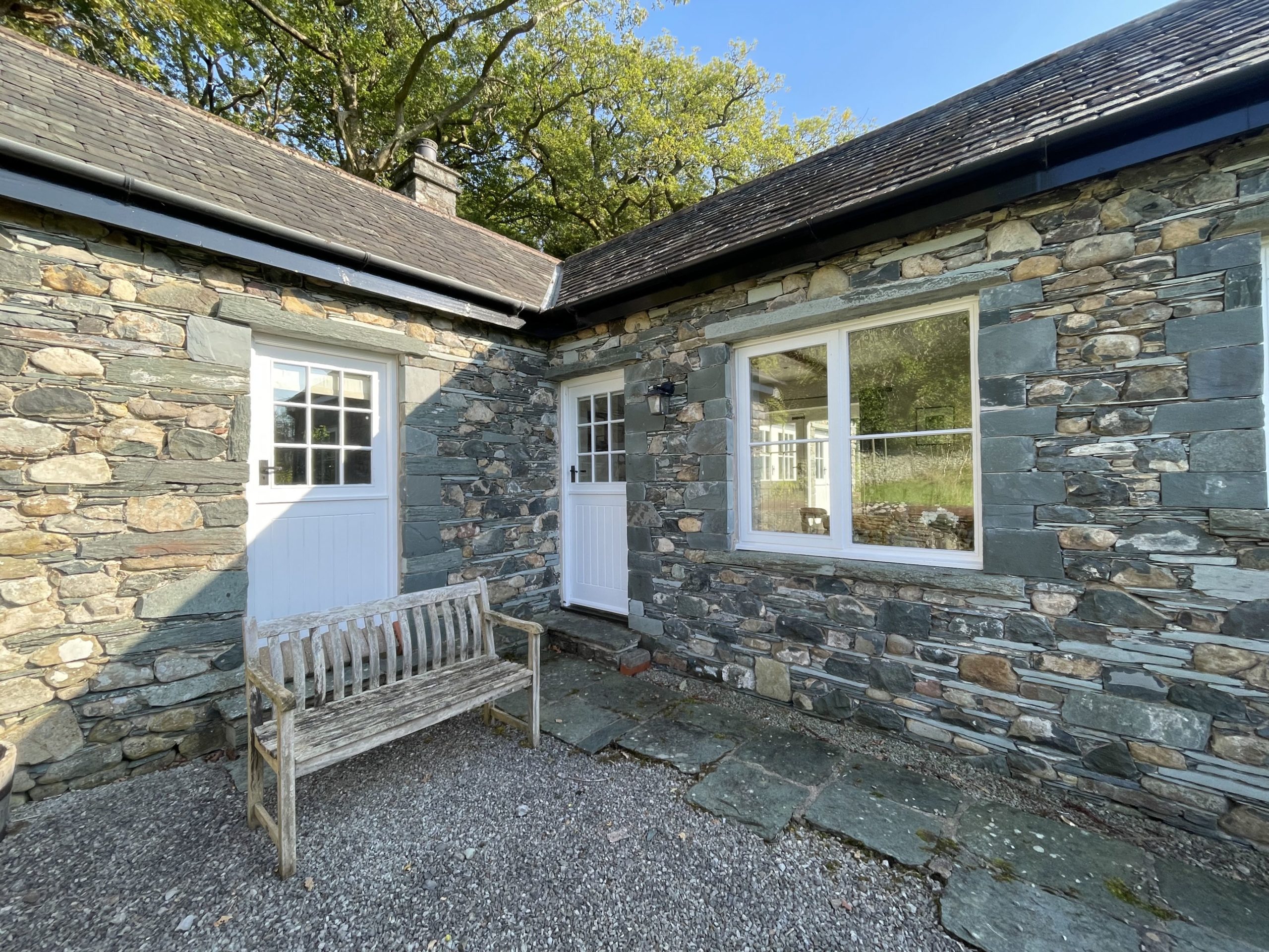 A pretty seating area at the front of the cottage