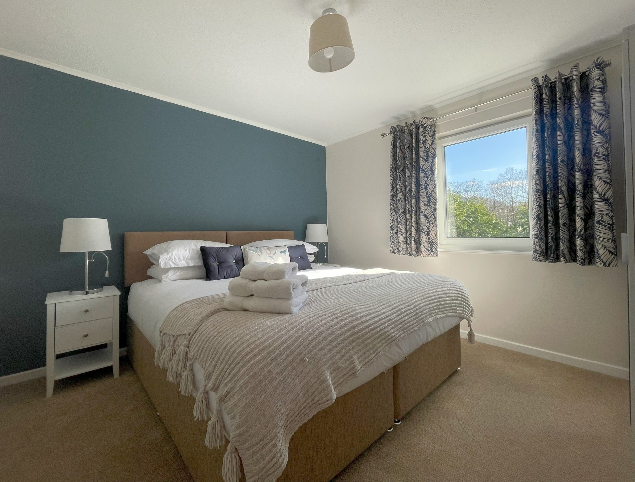 The bedroom at the back has super king zip and link beds 
