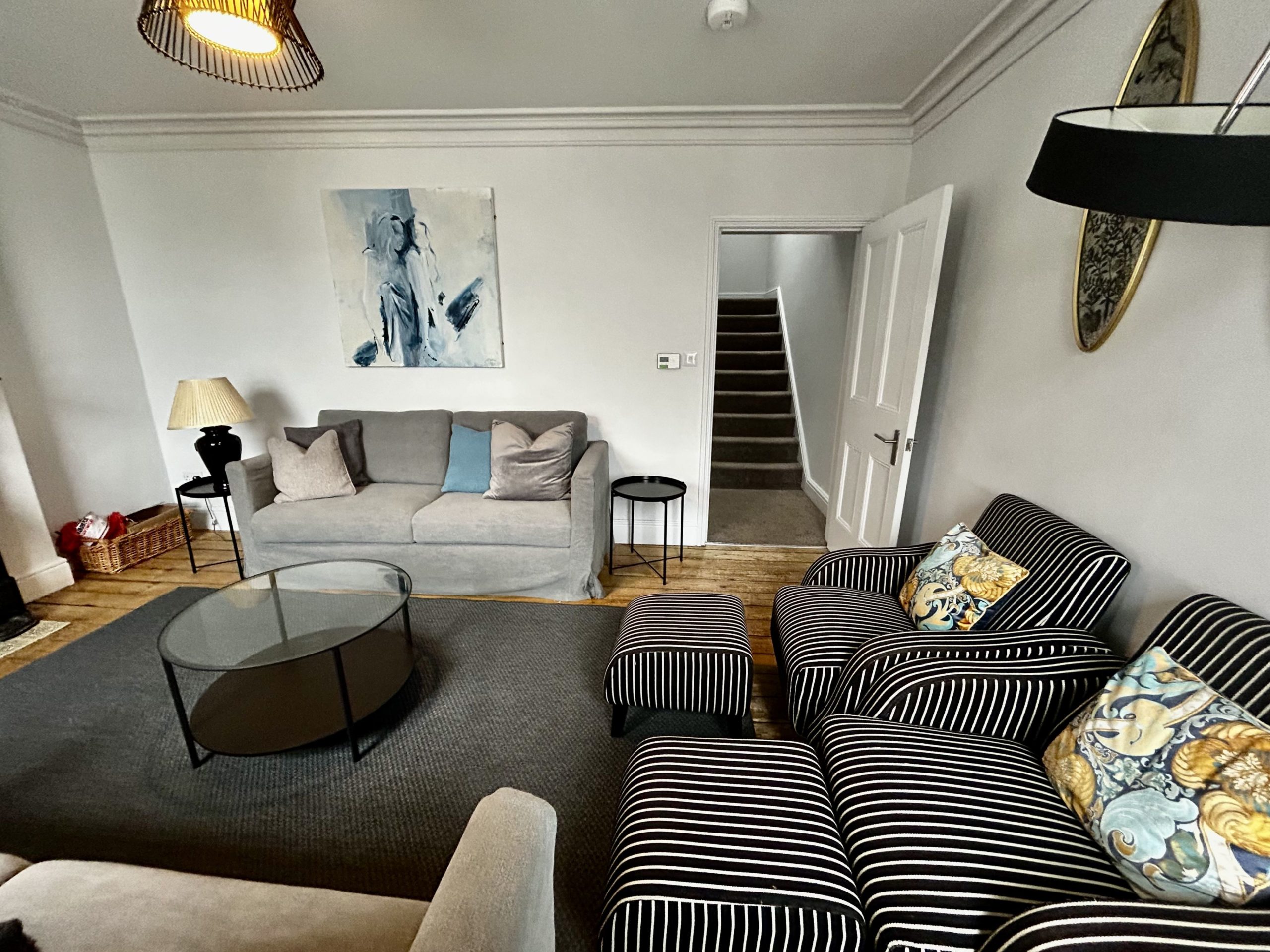 With NEW sofas, unwind in the spacious living room.