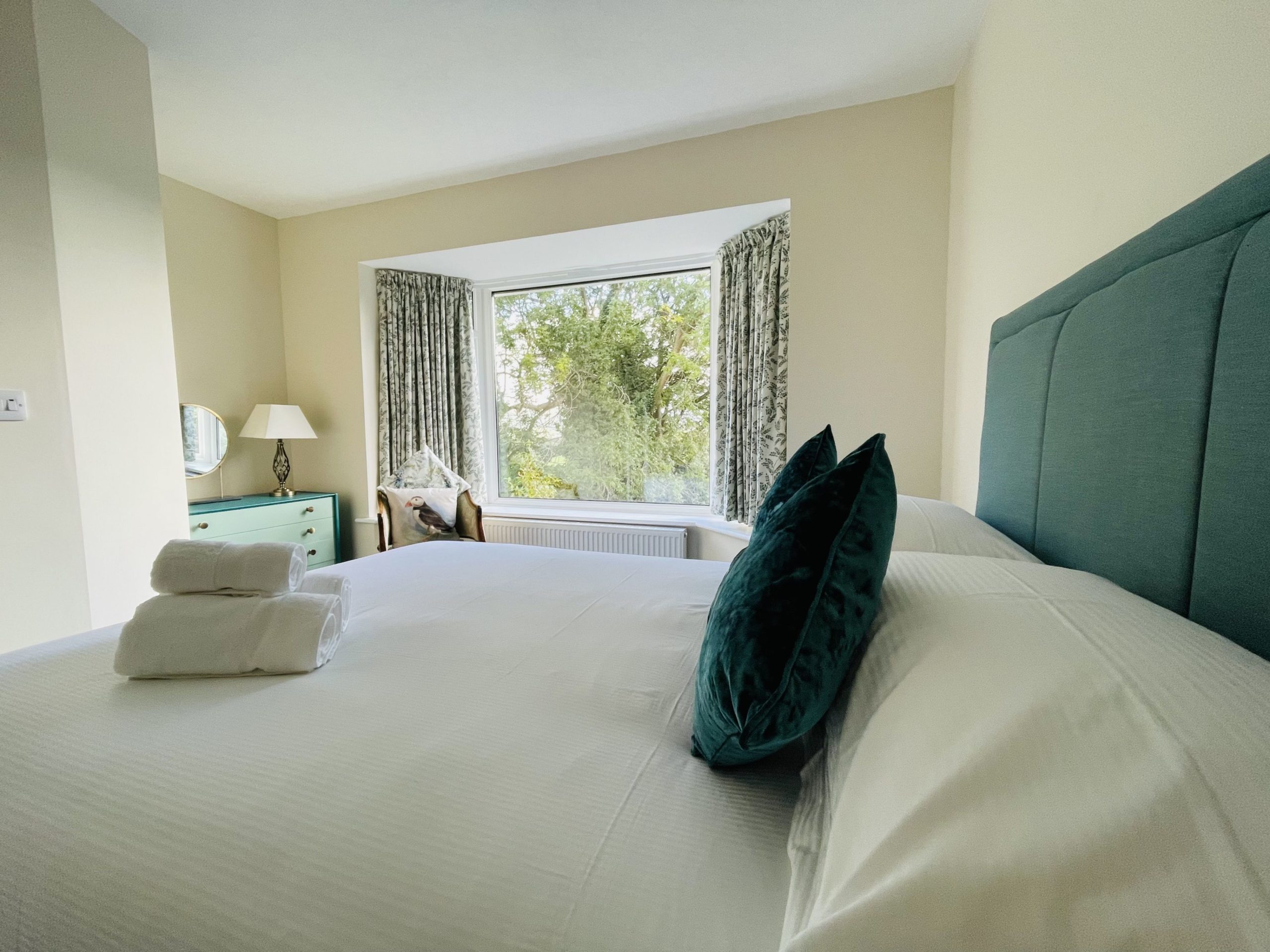 Watch the birds and take in the views from the comfort of your bed
